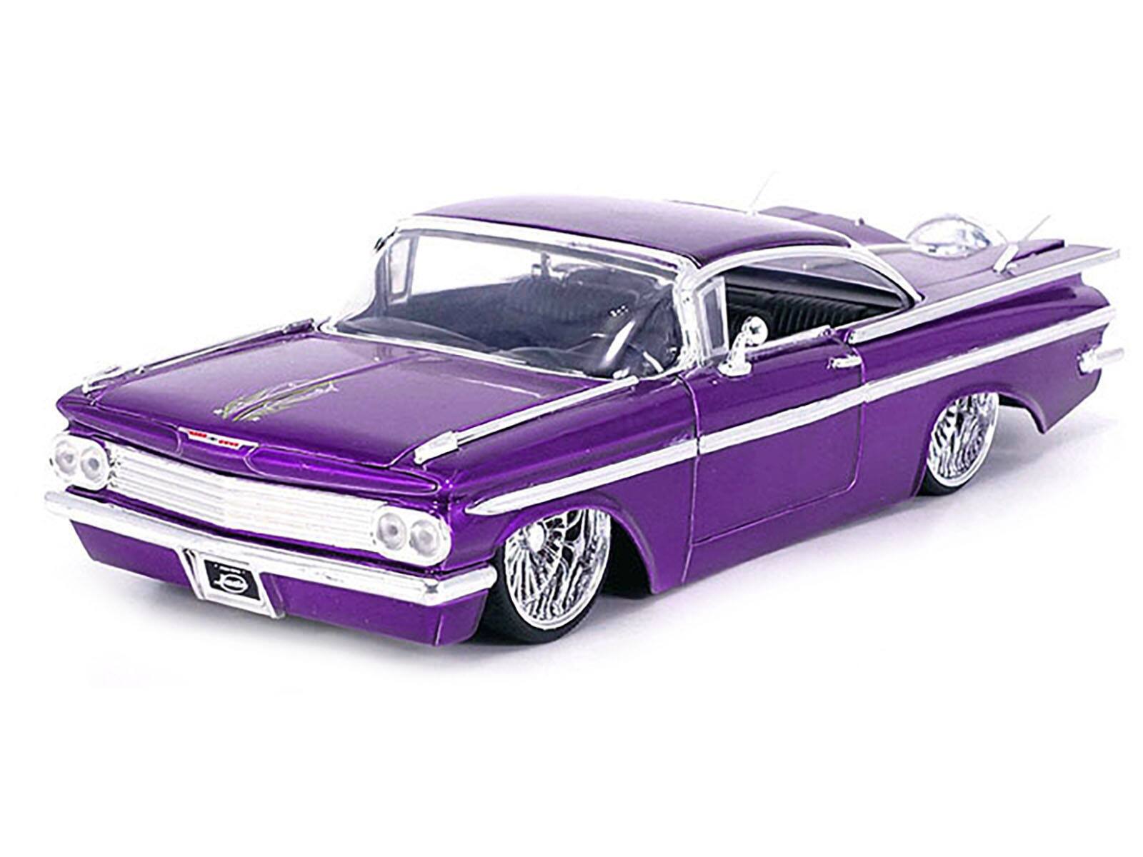 Angle. Jada - 1959 Chevrolet Impala Lowrider Candy Purple with DUB Wire Wheels "Street Low" Series 1/24 Diecast Model Car by Jada -  Candy Purple.