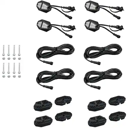 The image shows a variety of black wires and cords, including several sets of lights and power cords. There are also a number of black plugs and sockets, as well as a few switches and outlets. The arrangement of these items suggests that they are being displayed for sale or use in a home or business setting.