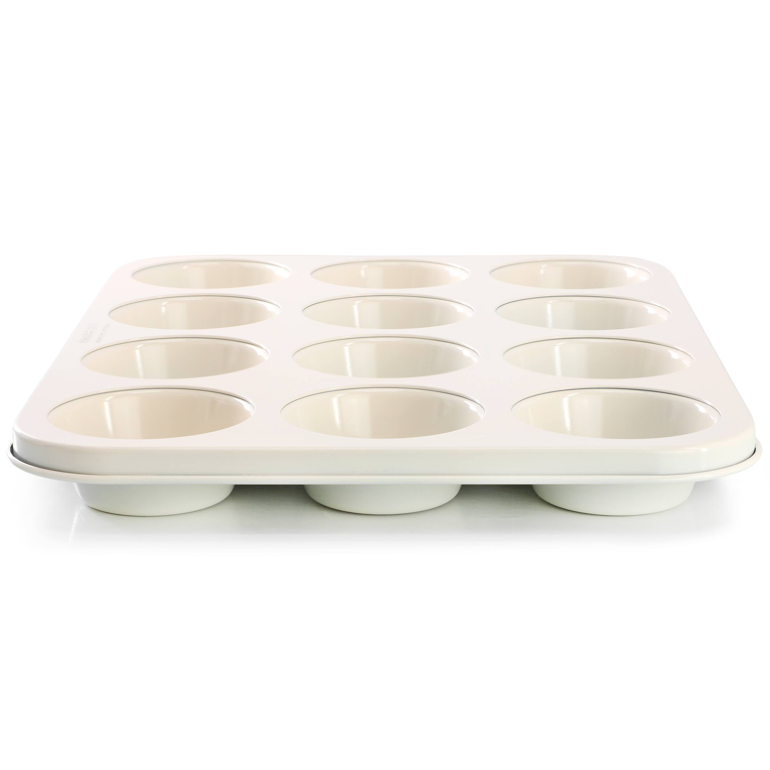 Alt View 1. Martha Stewart - Martha Stewart Everyday Color Bake 12 Cup Nonstick Steel Muffin Pan in Linen - Linen.