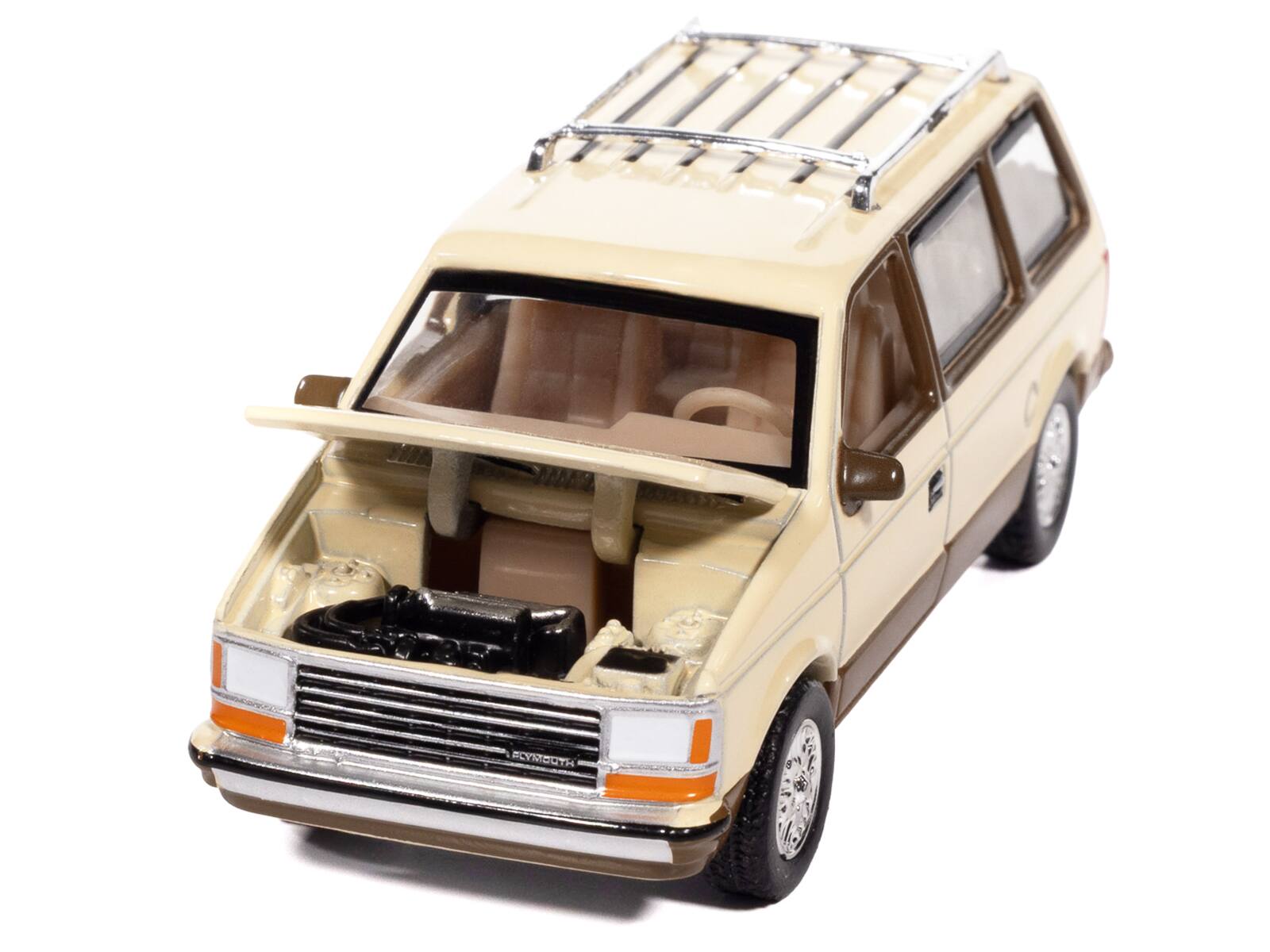 Angle. Autoworld - 1987 Plymouth Voyager Van Light Cream and Golden Bronze Metallic 2-Tone "Mighty Minivans" Series 1/64 - Light Cream and Golden Bronze Metallic.