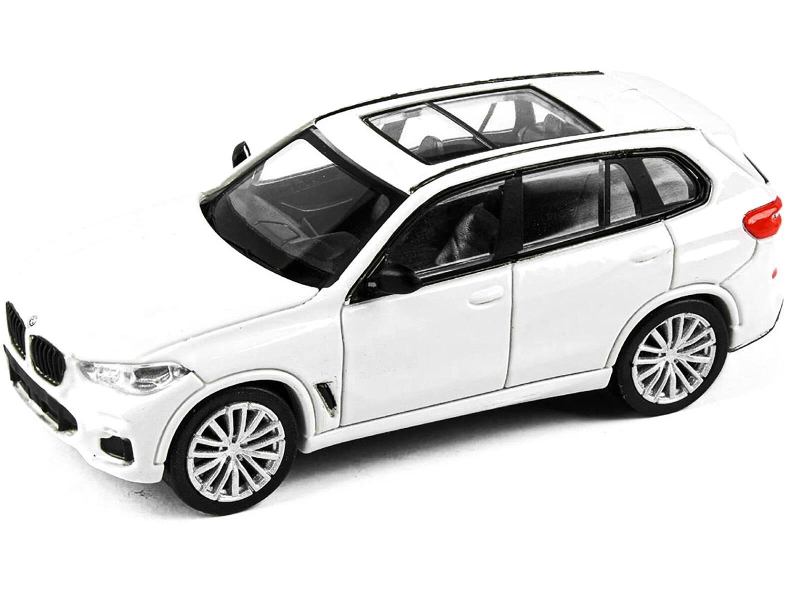 Angle. Paragon - BMW X5 (G05) with Sunroof Mineral White 1/64 Diecast Model Car by Paragon - White.