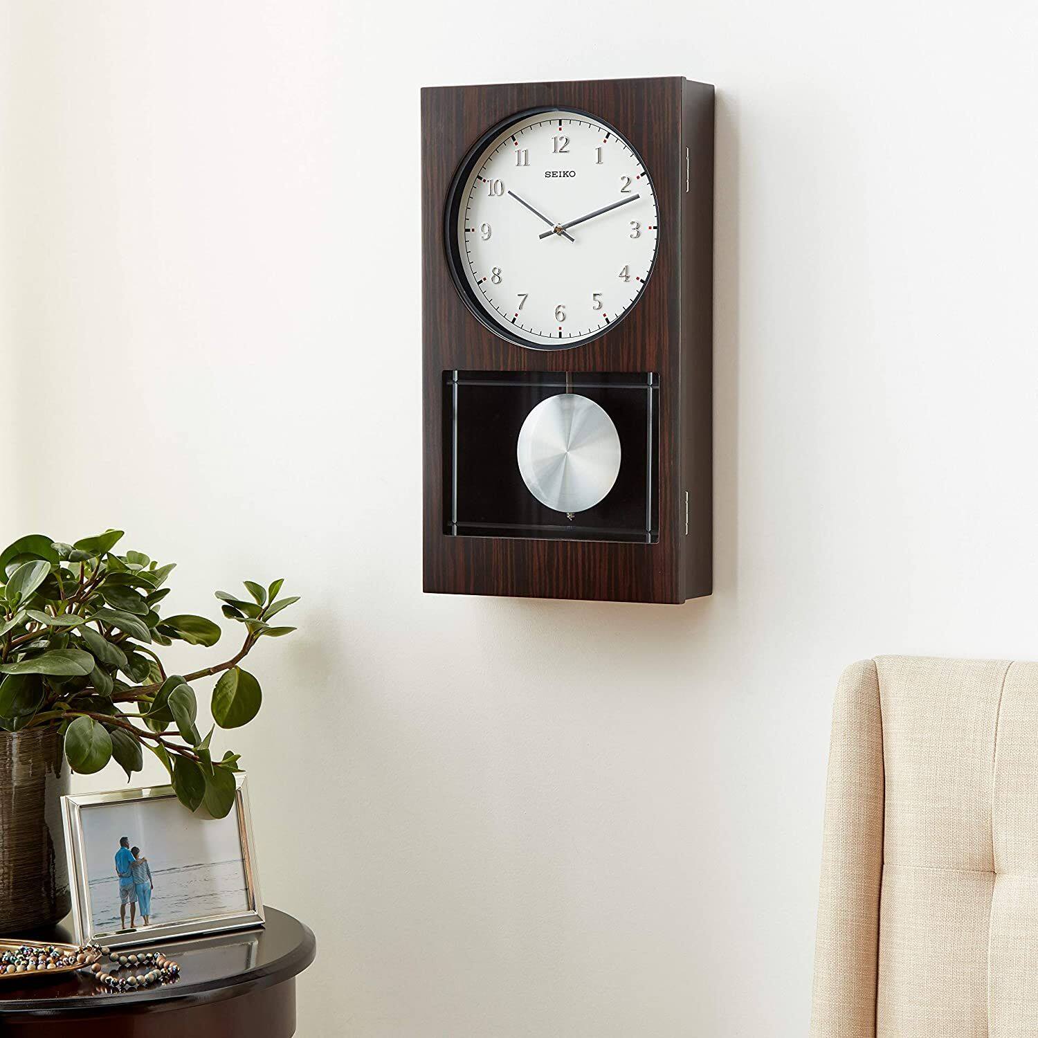 Back. Seiko - Seiko Modern Dark Wooden Wall Clock with Pendulum and Dual Chimes - Dark Brown.