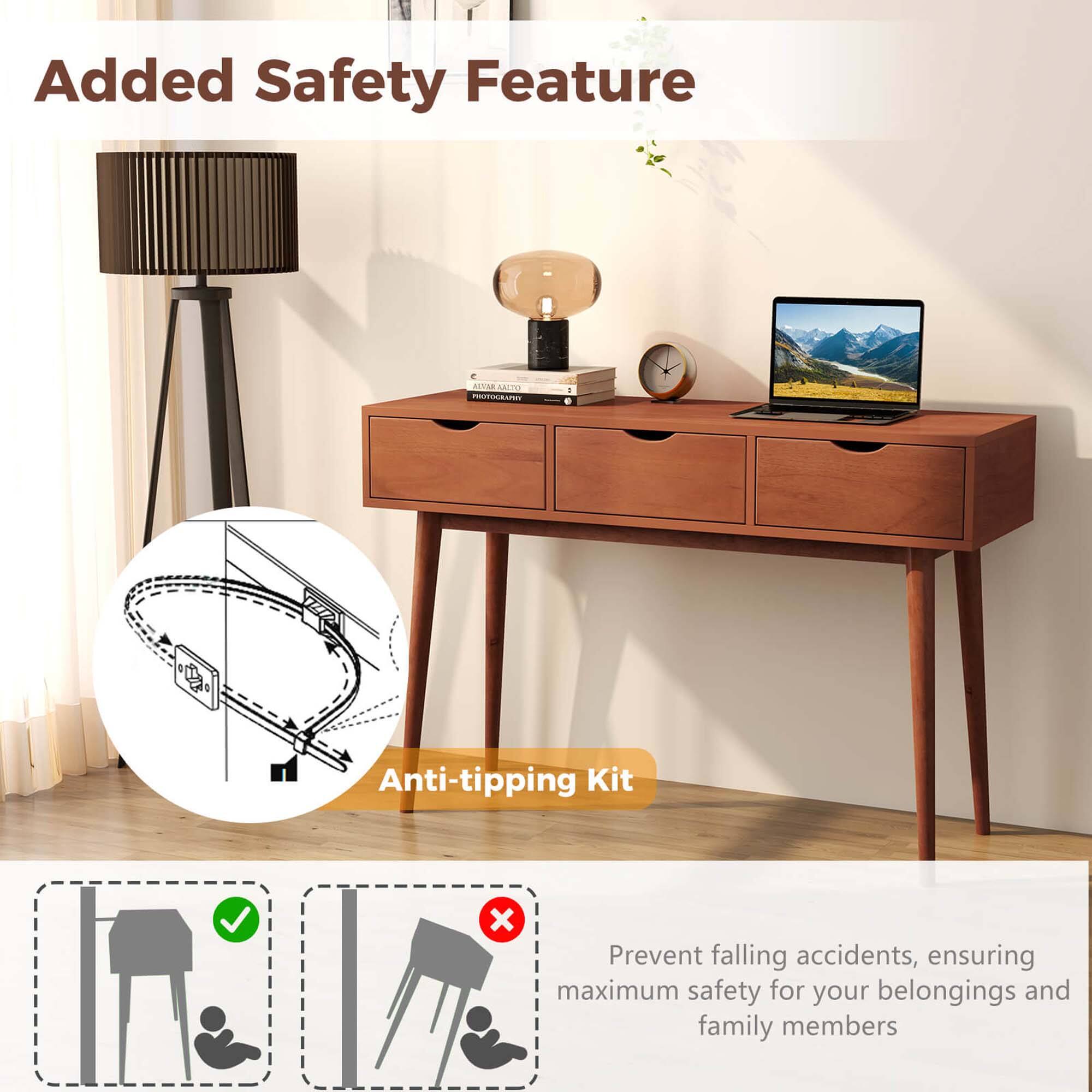 The image shows a desk with a laptop on it, and there is a sign that says "Added Safety Feature." The sign also includes an Anti-tipping Kit, which is designed to prevent falling accidents and ensure maximum safety for your belongings and family members.