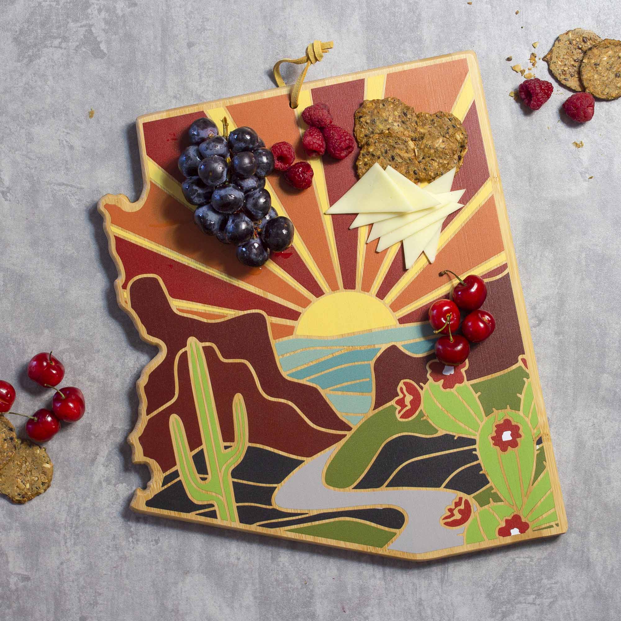 Angle. Totally Bamboo - Arizona Cutting Board with Artwork by Summer Stokes.