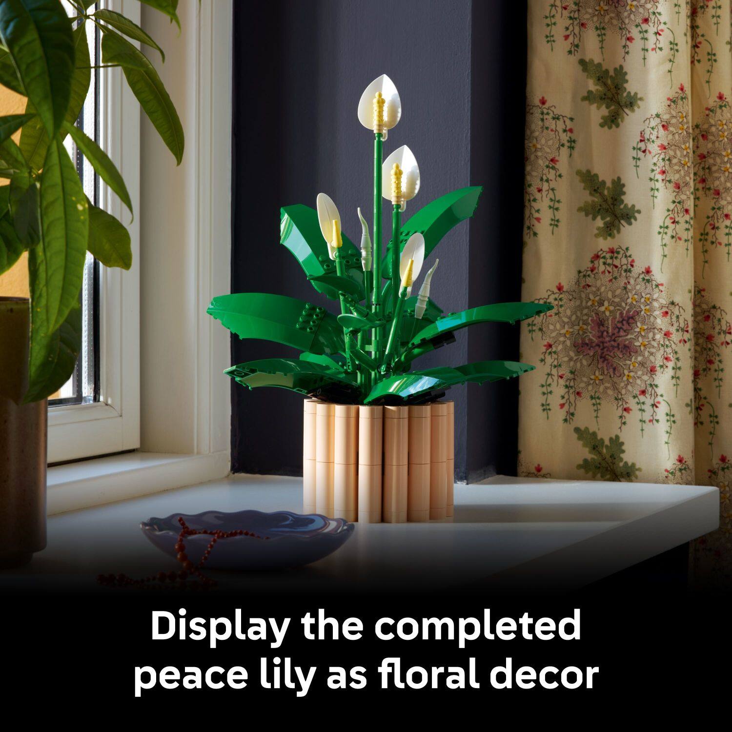 Display the completed peace lily as floral decor