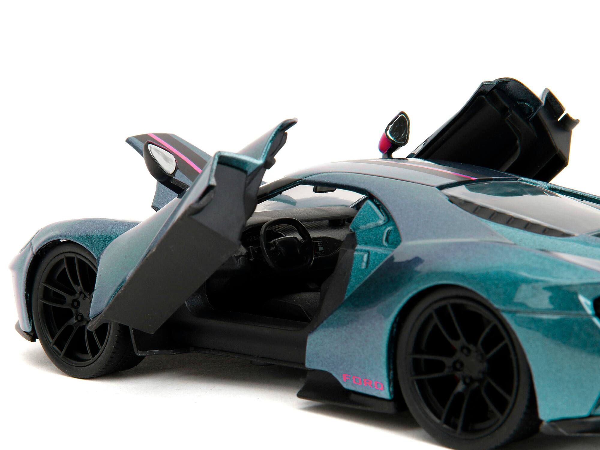 Left. Jada - 2017 Ford GT Blue Metallic with Pink and Black Stripes "Pink Slips" Series 1/24 Diecast Model Car by Jada - Blue Metallic With Pink And Black.