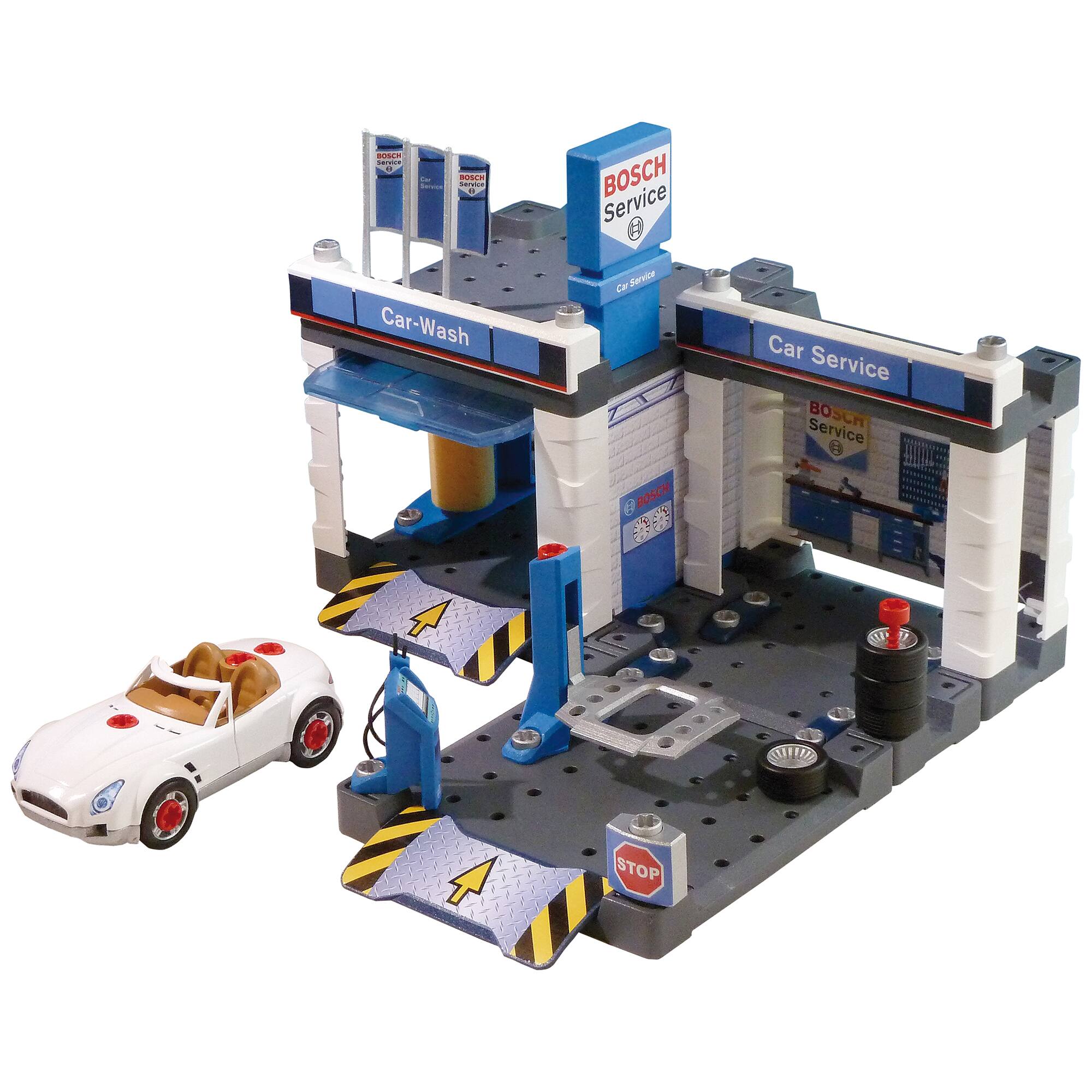 A series of BOSCH Service Car-Wash and Service Car Service signs are displayed in the image. The signs are placed in front of a toy car wash and service station. The toy car is parked in front of the building, and the signs are arranged in a way that they are easily visible to passersby.