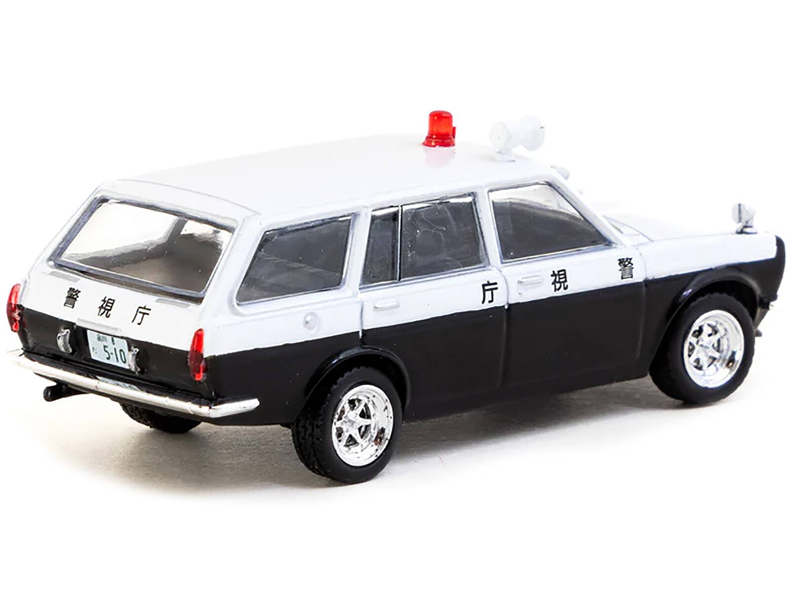 Angle. Tarmac Works - Datsun Bluebird 510 Wagon "Japan Police Car" Black and White "Global64" Series 1/64 Diecast Model by Tarmac Works - Black and White.