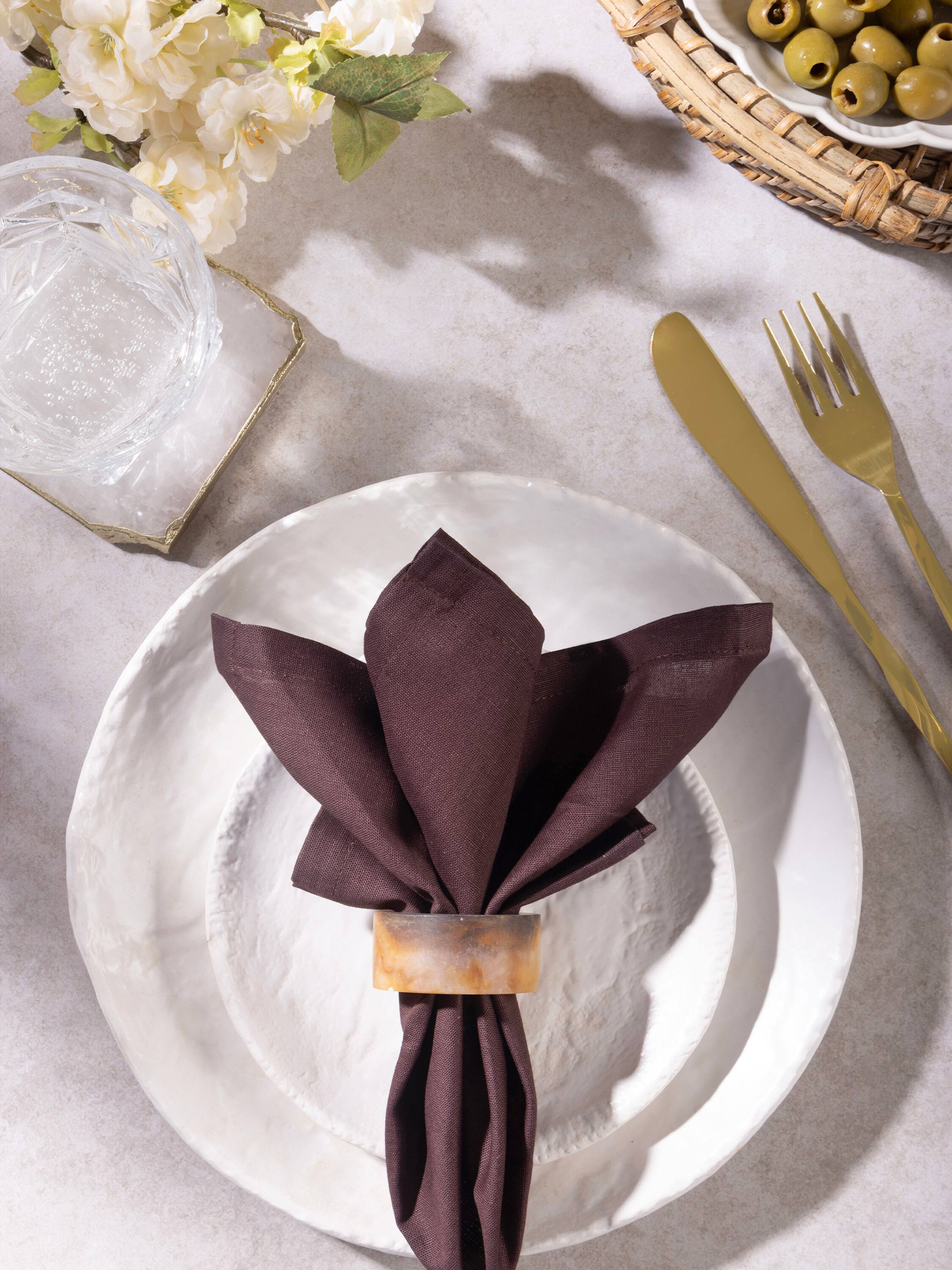 Angle. GAURI KOHLI - Kampai Napkin Rings - Shades of brown.