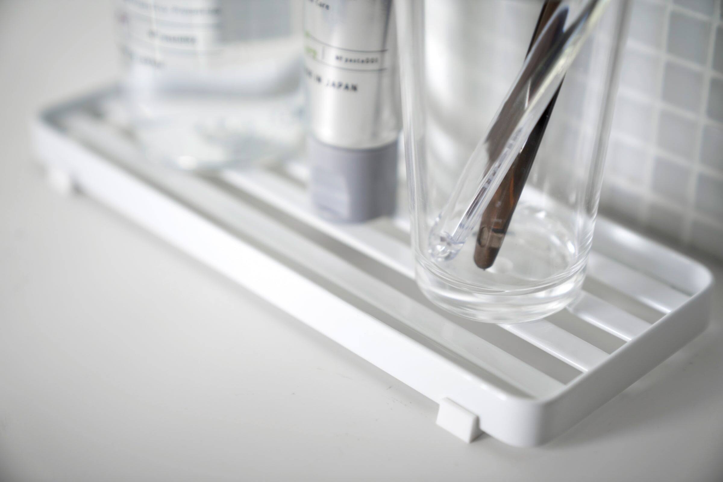 Left. Yamazaki Home - Slotted Bathroom Tray - Steel - Wit.
