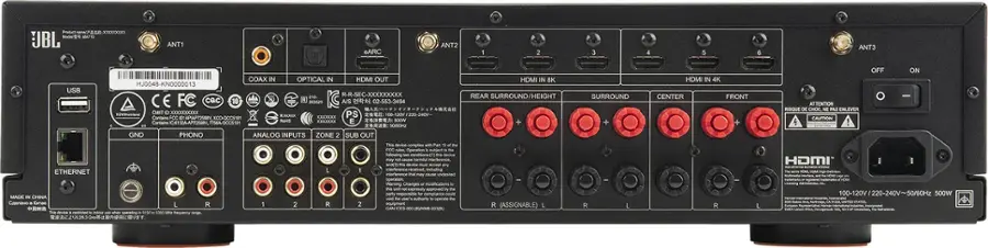 The text on the image reads:

"Ptum M JBL EXS ANT1 eARC ANT2 2 3 4 5 6 ANT3 USB COAX IN OPTICAL IN HDMI OUT HJ0048-KN0000013 R-R SEC XXXXXXXXXXX 50 ~ CE COc 10 C A/S 02-553-3494 ma T D X0XXXXXXXXXX PS nhngon SL RN 0-240V- Contains TOE O XCO-OCOME A RIHS XXXXXXX E SO0W Contains 5A-OCCS8 SRERE GND PHONO ANALOG INPUTS ZONE 2 SUB OUT HOMI IN 8K REAR SURROUND/HEIGHT + SURROUND + HDMI IN 4K CENTER FRONT + ATTENTION RISSQUE DE CHOC NE PAS ENLEVER CAUTION OFF ON ETHERNET L FE devece smpdtuns an v - Fer - Operation s - - Salowing - -A ns -s may - a - any I induding ntrancs HOMI MADE IN CHINA ."

The text is grouped as follows:

1. Ptum M JBL EXS ANT1 eARC ANT2 2 3 4 5 6 ANT3 USB COAX IN OPTICAL IN HDMI OUT HJ0048-KN0000013 R-R SEC XXXXXXXXXXX 50 ~ CE COc 10 C A/S 02-553-3494 ma T D X0XXXXXXXXXX PS nhngon SL RN 0-240V- Contains TOE O XCO-OCOME A RIHS XXXXXXX E SO0W Contains 5A-OCCS8 SRERE GND PHONO ANALOG INPUTS ZONE 2 SUB OUT HOMI IN 8K REAR SURROUND/HEIGHT + SURROUND + HDMI IN 4K CENTER FRONT + ATTENT