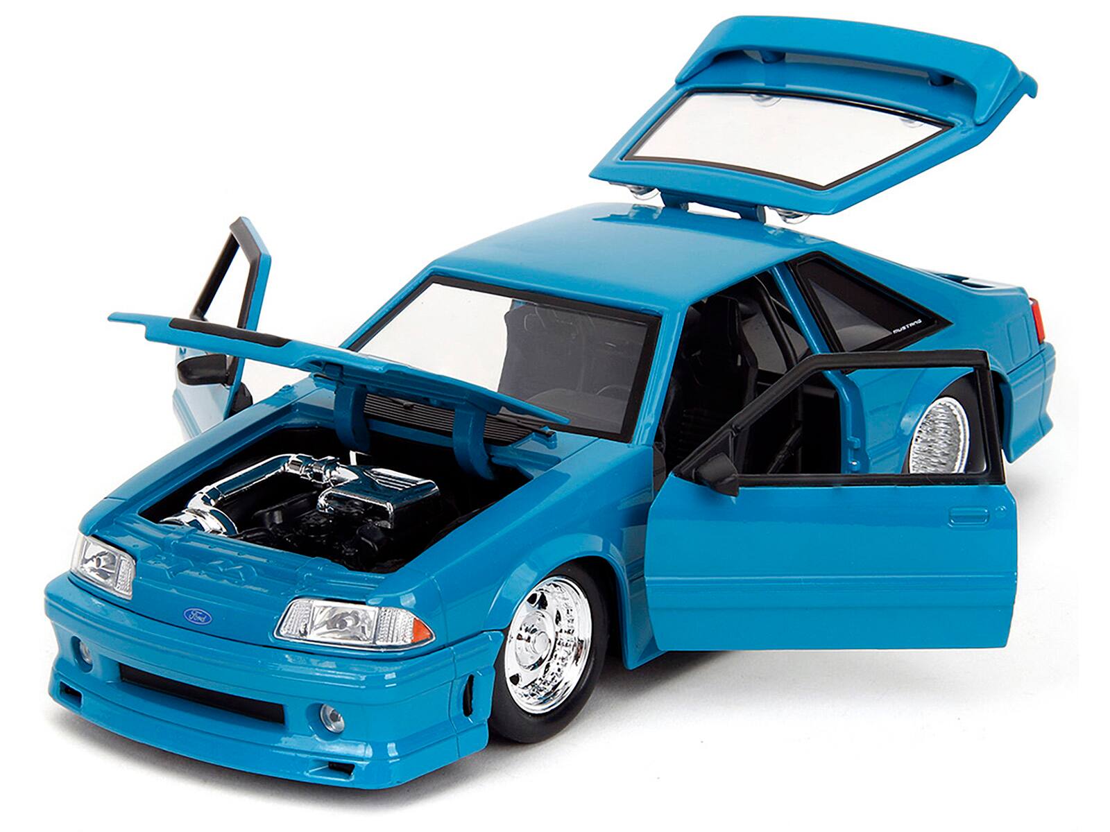 Angle. Jada - 1989 Ford Mustang GT Blue with Black Hood Stripes "Fast & Furious" Series 1/24 Diecast Model Car by Jada - Blue With Black.