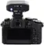 The image shows a camera with a lock function and a mode setting. The camera has a display screen that shows the mode and lock settings. The camera also has a lock function and a menu setting, which allows the user to adjust various settings such as ISO, white balance, and display options. The camera is equipped with an autofocus system, which enables the user to focus on their subject with ease. Additionally, the camera has a viewfinder, which provides a clear view of the subject being photographed.