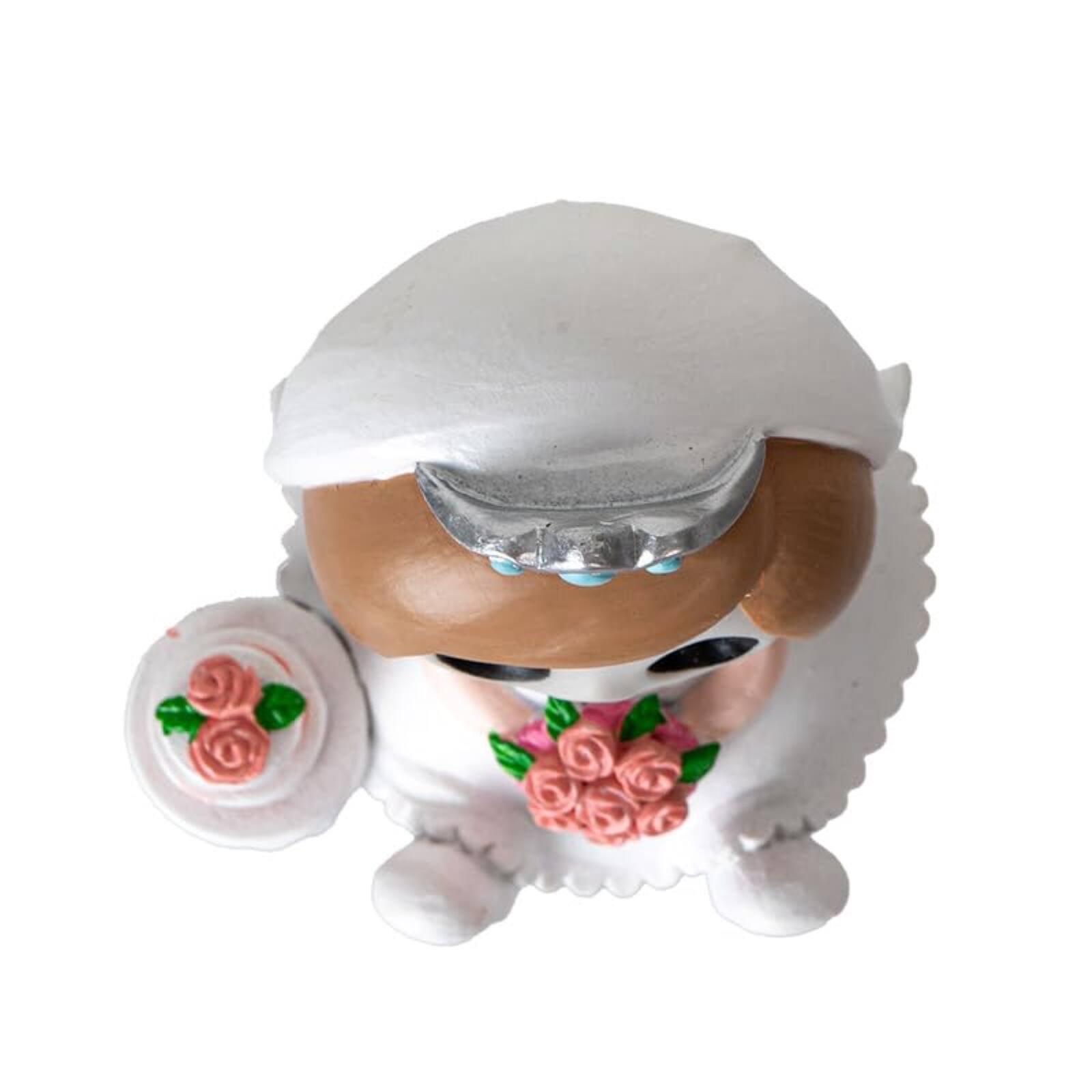 Left. Pacific Trading - Mrs. Furrybones Figurine Skeleton Bride in Wedding Dress Holding Bouquet with Cake 3.15 Tall - White.