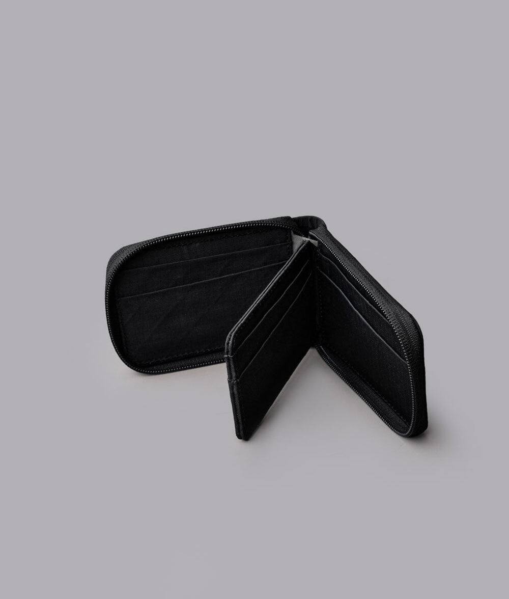 Angle. ALPAKA - Zip ID Wallet with ID Window, RFID Protection, Holds 10+ Cards, Zip-Around Closure, Gift-Ready Box - Black Axogrid 210D.