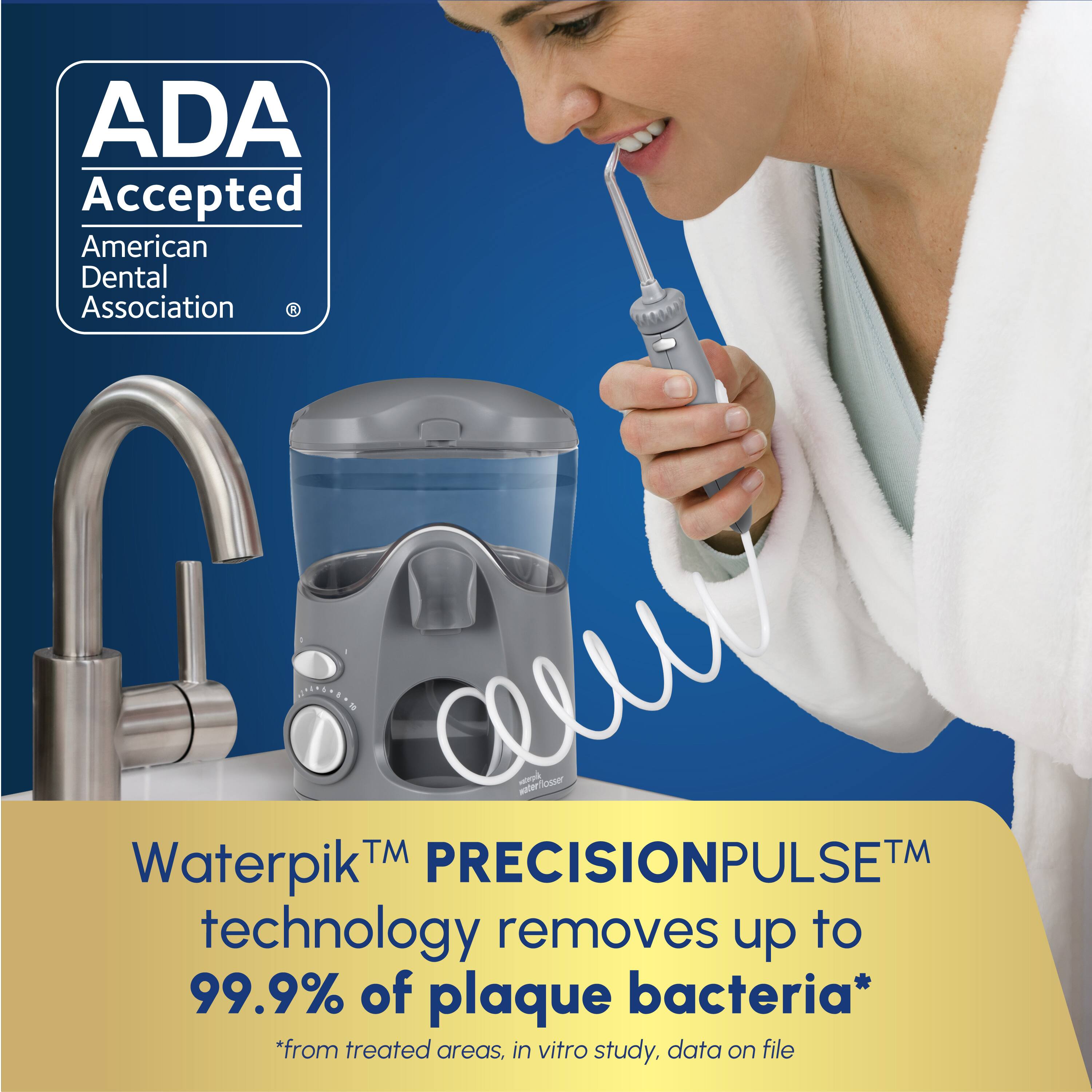 ADA Accepted American Dental Association Waterpik PRECISIONPULSE TM Technology removes up to 99.9% of plaque bacteria from treated areas, in vitro study. Data on file.
