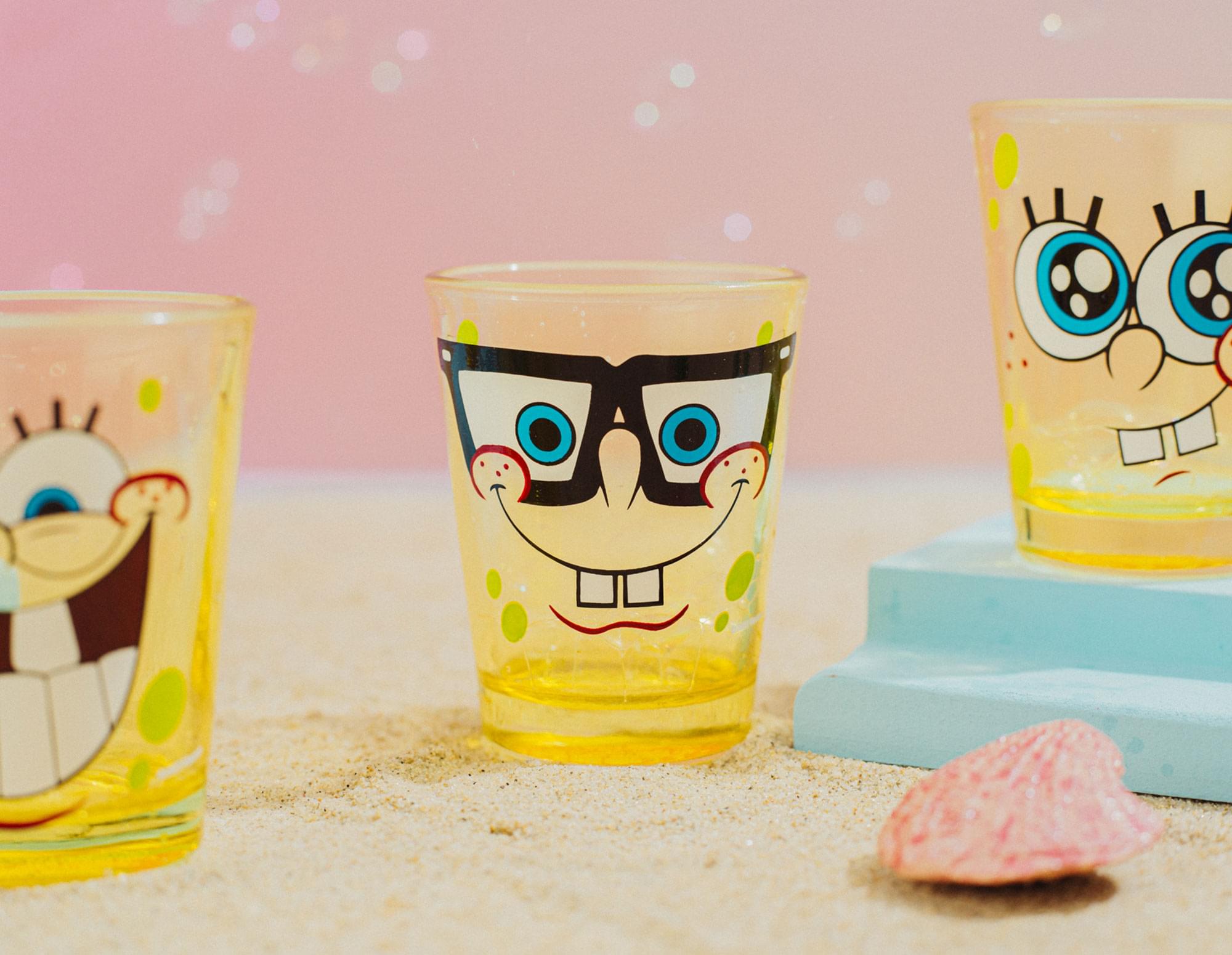 Alt View 4. Silver Buffalo - Nickelodeon SpongeBob Faces 2-Ounce Mini Glasses | Set of 4 - Yellow.