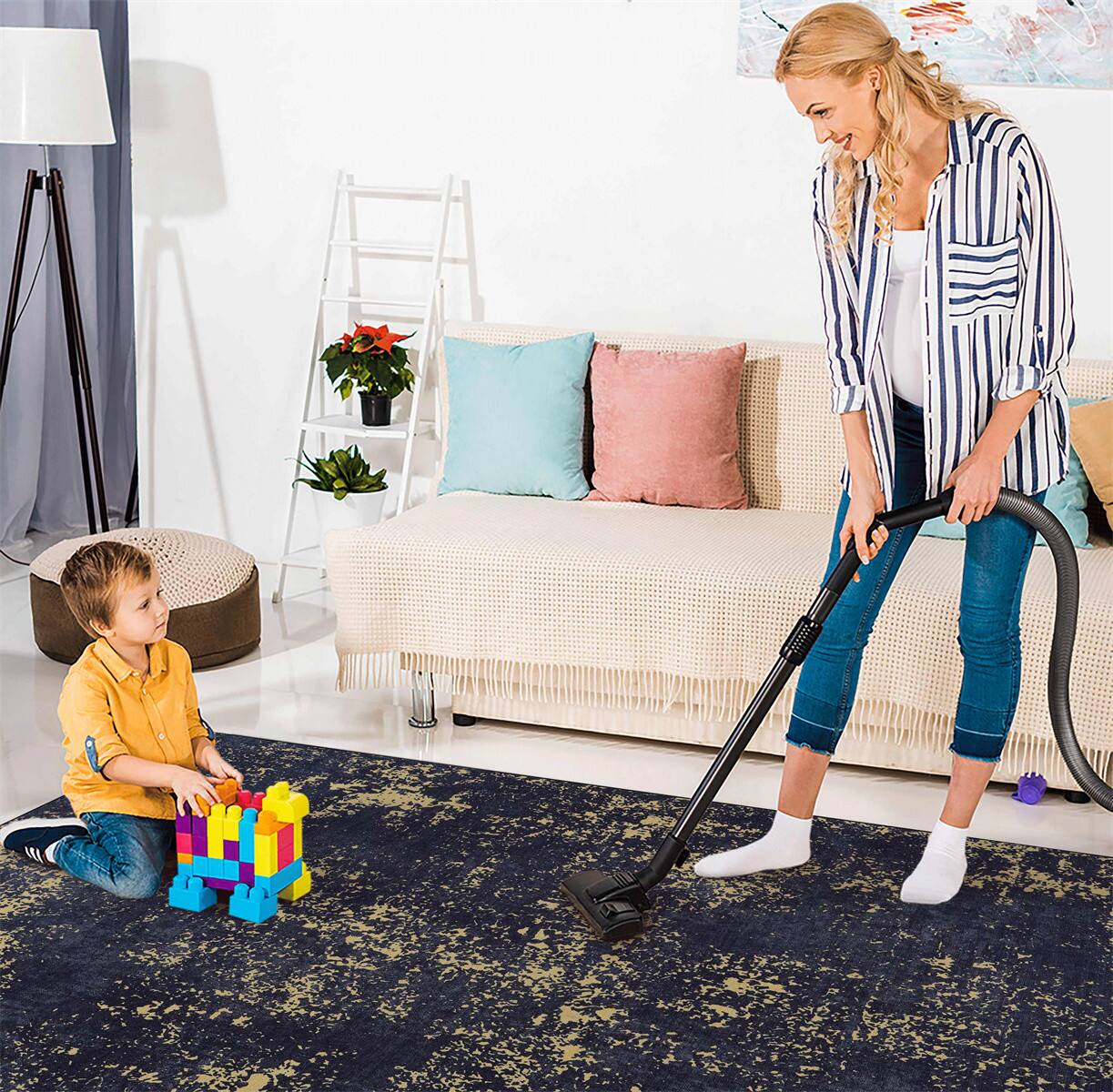 Angle. HTUTWOO - Washable Rug 8x10 - Chenille Low Pile, Machine Washable, Non-Slip TPR Backing, Stain Resistant, Living Room Bedroom - Black Gold.