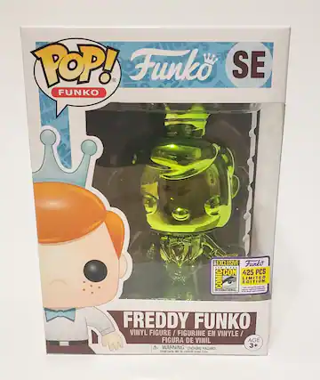 Sure, here is the corrected and grouped text from the image:
---
**POP!**
**Funko**
**SE**
**FREDDY FUNKO**
**VINYL FIGURE / FIGURINE EN VINYLE / FIGURA DE VINIL**
**AGE 3+**
**WARNING: CHOKING HAZARD**
**Small parts. Not for children under 3 years.**
**Funko Exclusive**
**425 PCS LIMITED EDITION**
**INTERNATIONAL COMIC-CON**
---
This text is organized to reflect the information on the packaging accurately.