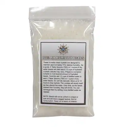 70% RH HUMIDITY BEADS
These humidity bead crystals are designed to maintain approximately 70% relative humidity. As a guide, 2 Table Spoons (TBS) or 1 ounce of dry water beads will yield about 12 cups of hydrated crystals (results may vary). Prepare a container suitable to hold the desired amount of hydrated beads. Carefully add 12 cups of distilled water to each 2 Table Spoons (TBS) or 1 ounce of dry water beads. Do not fully saturate. Allow up to 12 hours to fully hydrate. The crystals will slowly swell as they absorb the water. Over time, as the beads release their humidity, they will shrink. You can recharge them by adding more distilled water as needed.
NOTE: Beads will not be uniform in shape or size and will have a jagged texture. Not for consumption. Keep out of reach of children.