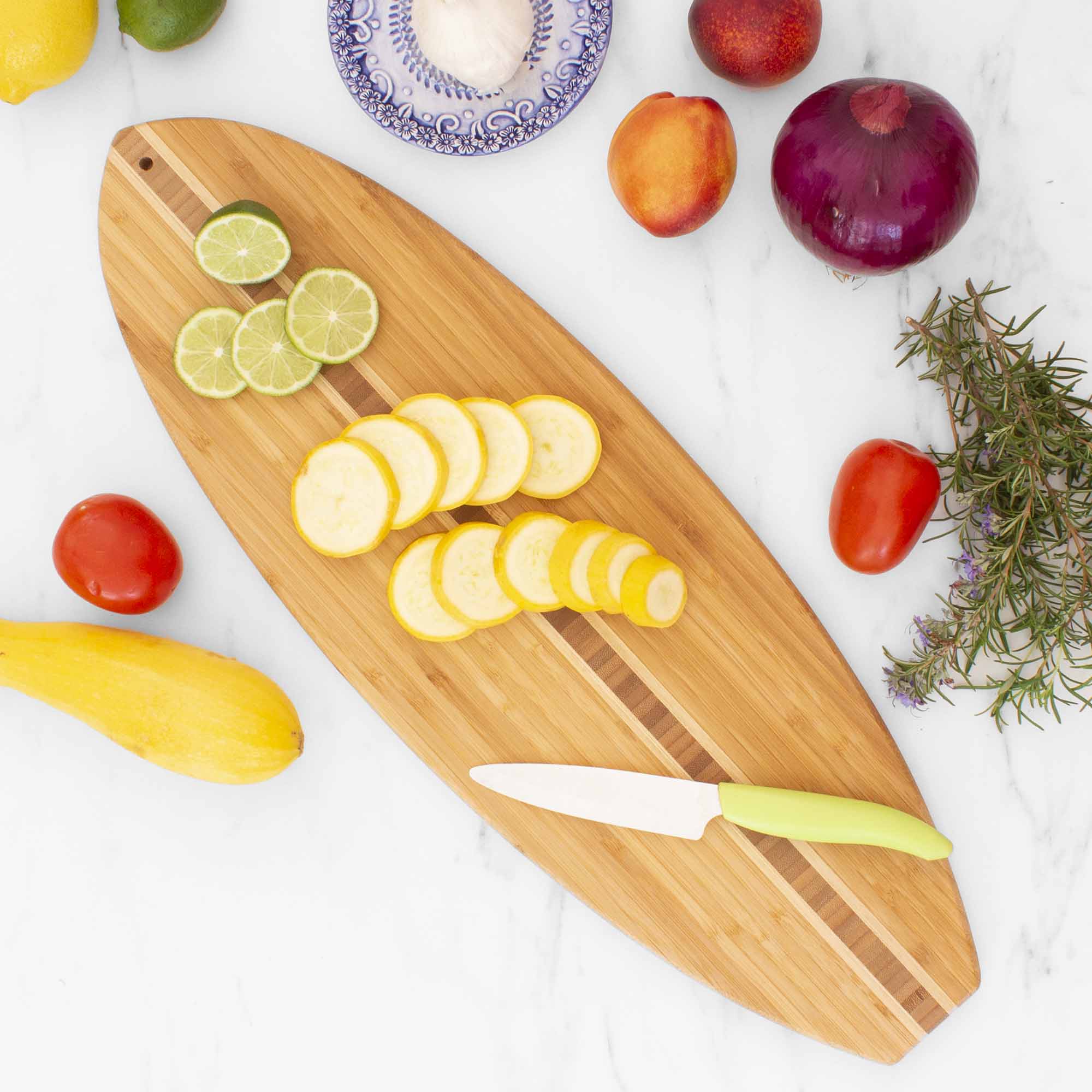 Left. Totally Bamboo - Surfboard Shaped Cutting Board, 23" x 7-1/2".
