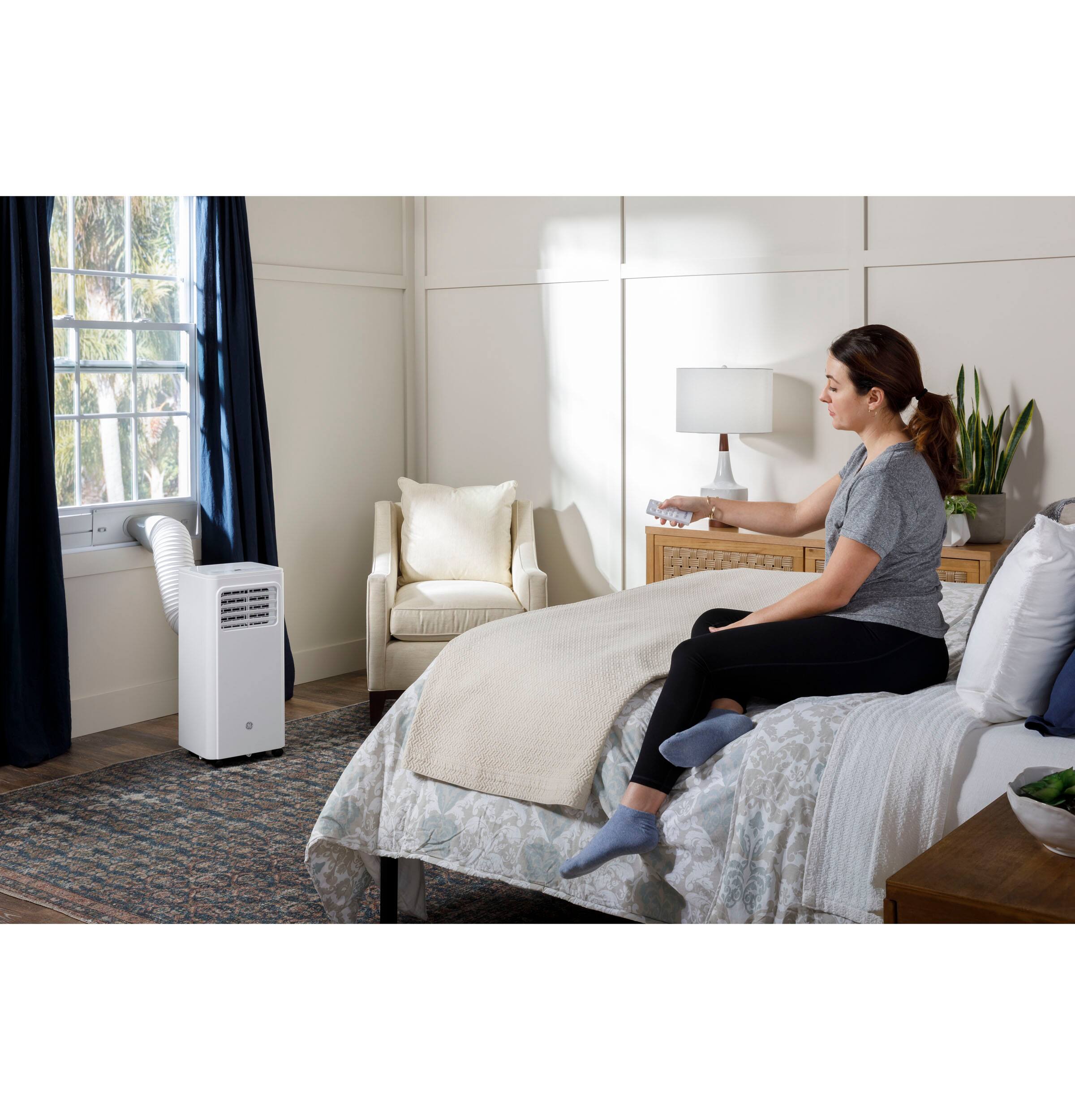 Alt View 13. GE - 250 Sq. Ft. 6,000 BTU Portable Air Conditioner with Auto Evaporation Technology - White.