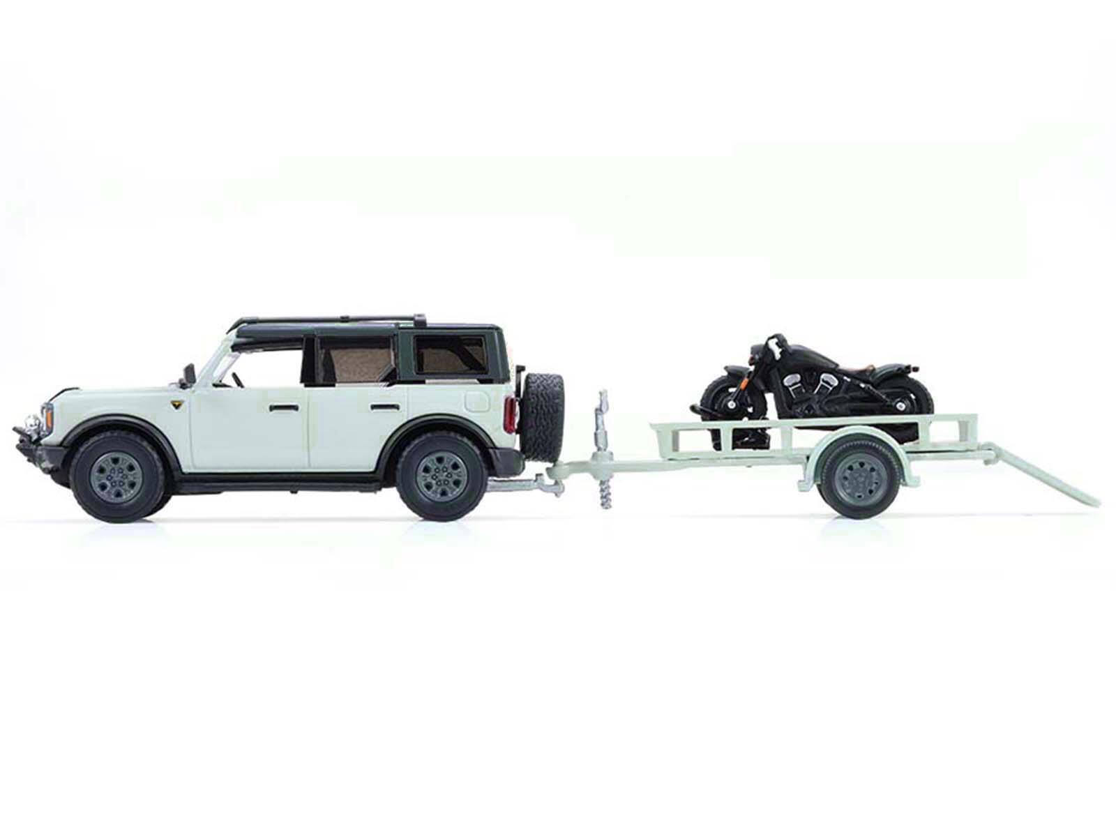Alt View 2. Greenlight - 2021 Ford Bronco 4-Door Badlands Cactus Gray with Black Top and Motorcycle with Trailer 1/64 Model Cars by Greenlight.