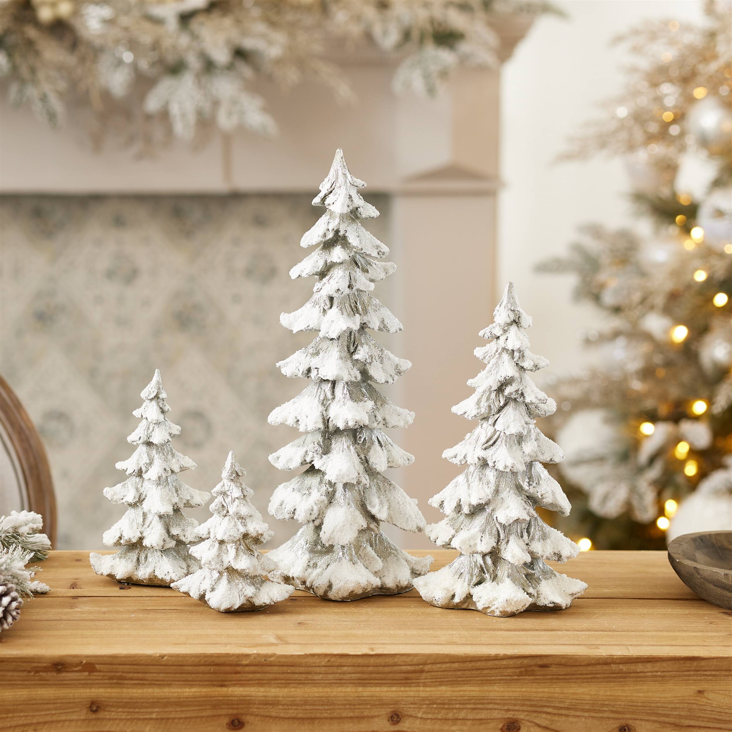 Angle. BreeBe - Frosted Pine Tree Decor with Silver Finish (Set of 4) - Silver.