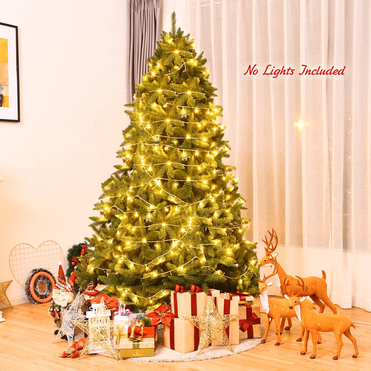 The image features a beautifully decorated Christmas tree with presents underneath it. The tree is adorned with lights, and there are reindeer figurines placed around it. The tree is placed in a living room, and there is a painting in the background. The text on the image indicates that the lights are not included, which means that the buyer needs to purchase additional lights to fully illuminate the tree.