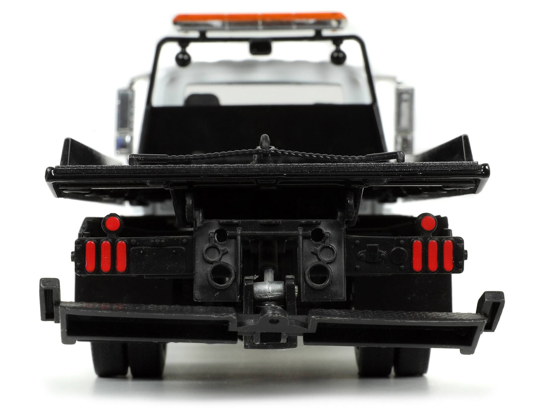 Alt View 5. Jada - International DuraStar 4400 Flatbed Tow Truck White 1/24 Diecast Model by Jada.