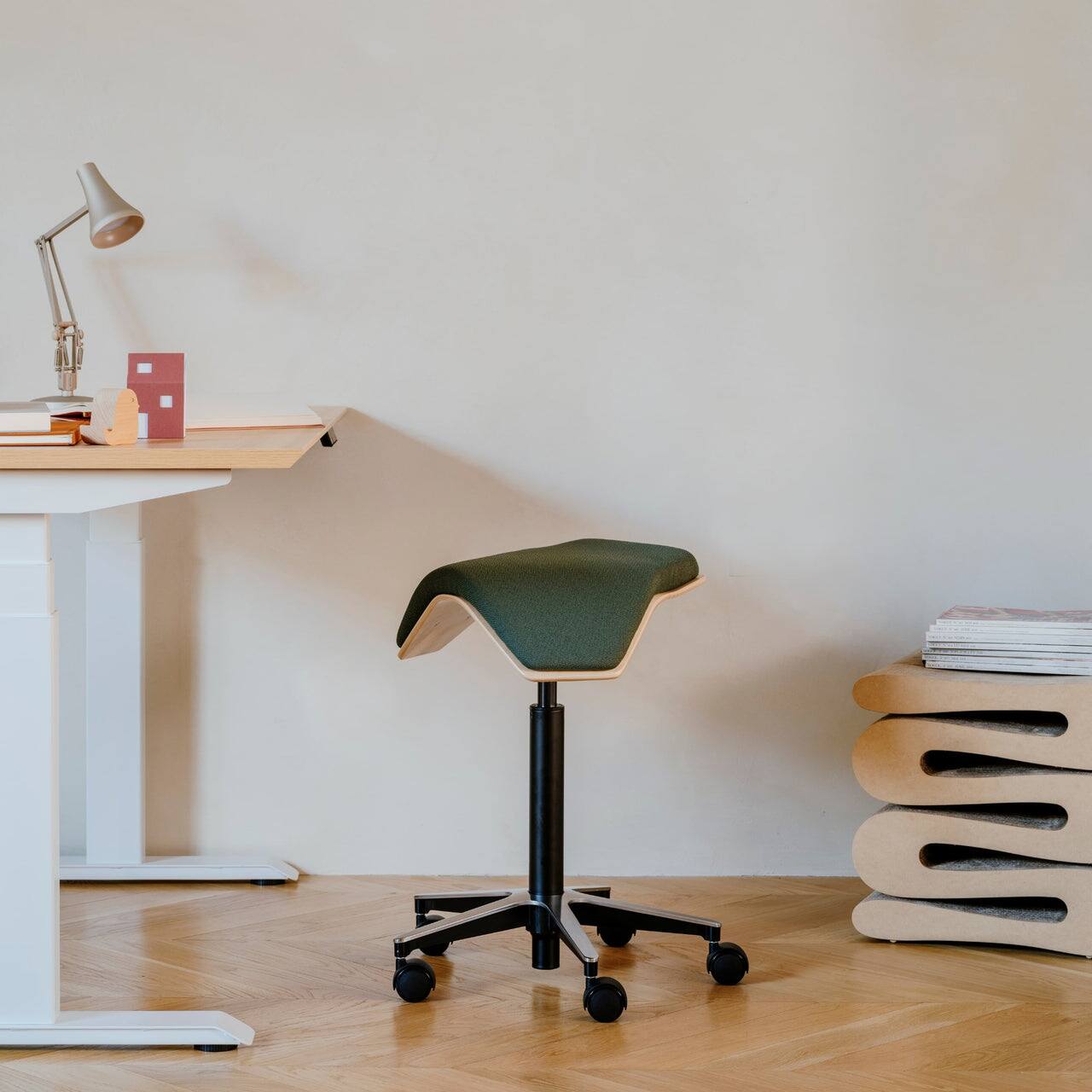 Left. Branch Furniture - Saddle Chair Plus - Forest / Wood.