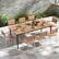 Angle. Costway - 79" Outdoor Dining Table for 8 Acacia Wood Patio Table with 1.9" Umbrella Hole - Natural + Black.