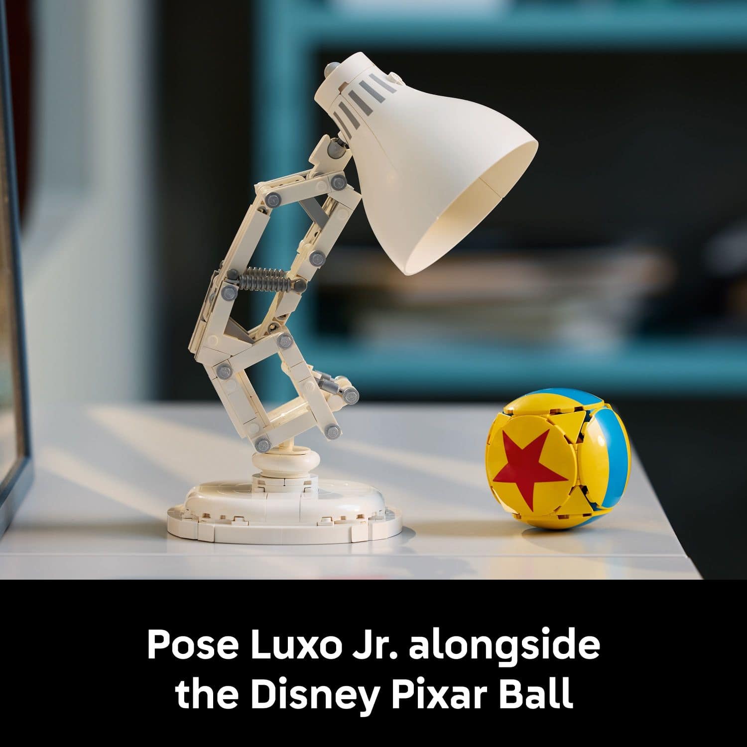 Pose Luxo Jr. alongside the Disney Pixar Ball.