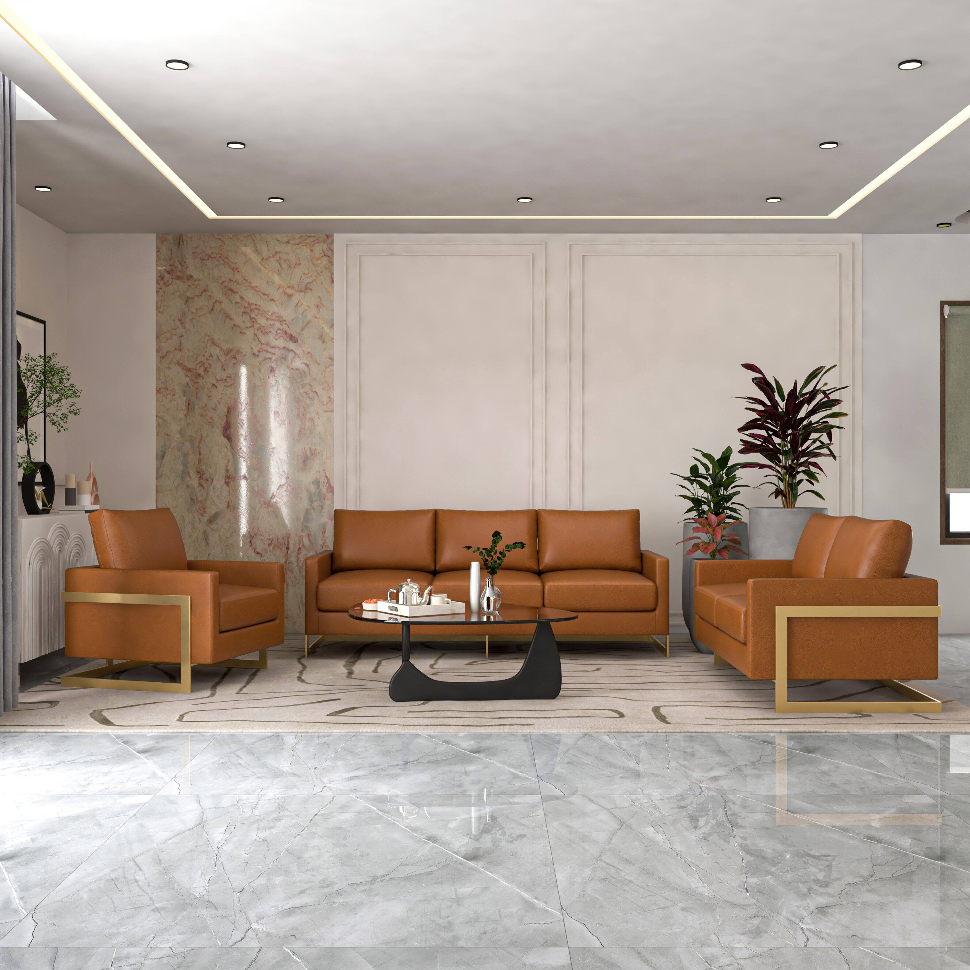 Angle. LeisureMod - Lincoln Modern Leather Accent Chair, Gold Stainless Steel Base Armchair - Fully Assembled - Cognac Tan.
