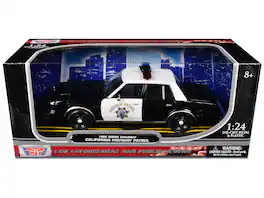 1986 Dodge Diplomat Police Car "California Hwy Patrol" Black and White 1/24 Diecast Model Car by Motormax