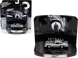 1964 Aston Martin DB5 Birch 1/64 Diecast by Johnny Lightning with Collectible Tin Display "007" Skyfall - Silver