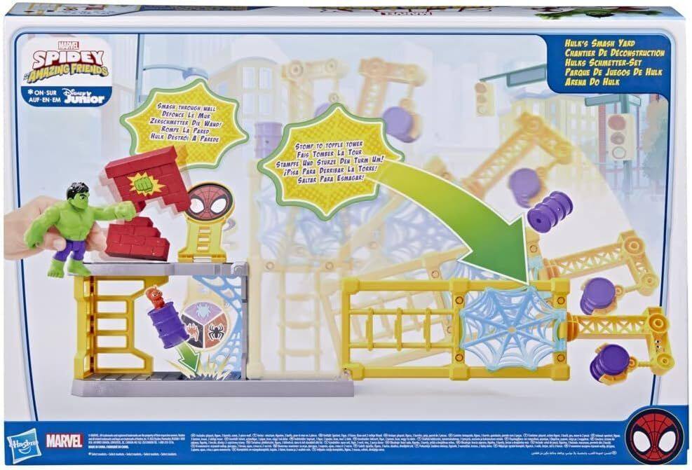 The text on the image is:

"SPIDEY AMAZING FRIENDS
ON-SUR AUF-EN-EM Junior
SMASH THROUGH WALL
ZERSCHMETTER DIE WAND!
ROMPE LA PARED
HULK DESTROI A PAREDE
STOMP TO TOPPLE TOWERS
FAIS TOMBER LA TOUR
STURZE DEN TURM UN!
STAMPFE UND PARA DERRIBAR LA TORRE!
PISA PARA ESMAGAR!
HULK'S SMASH YARD
CHANTIER DE DECONSTRUCTION
HULKS SCHMETTER-SET
PARQUE DE JUEGOS DE HULK
ARENA DE HULK
MARVEL"