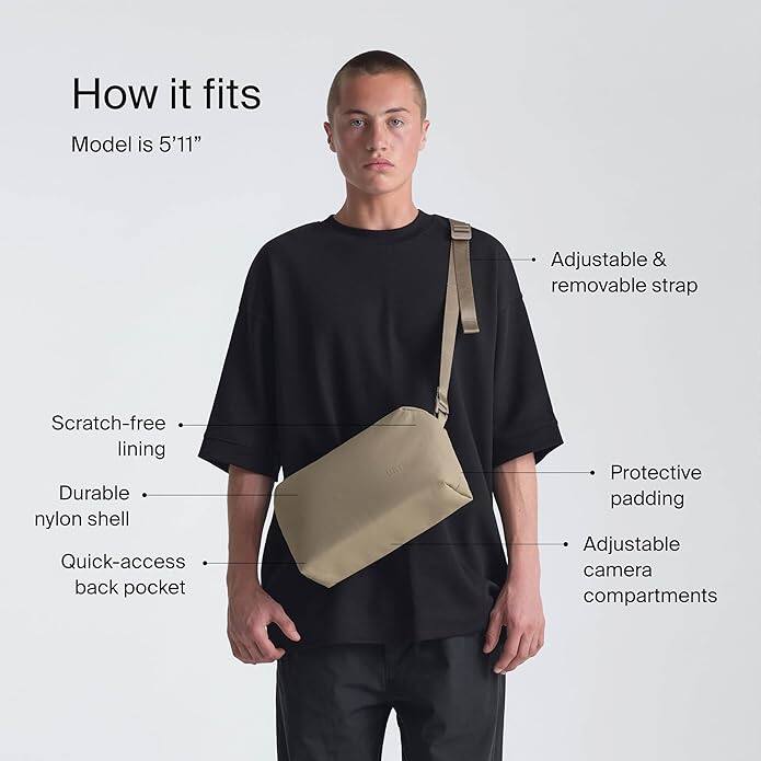 How it fits  
Model is 5'11"  

- Adjustable & removable strap  
- Scratch-free lining  
- Durable nylon shell  
- Quick-access back pocket  
- Protective padding  
- Adjustable camera compartments