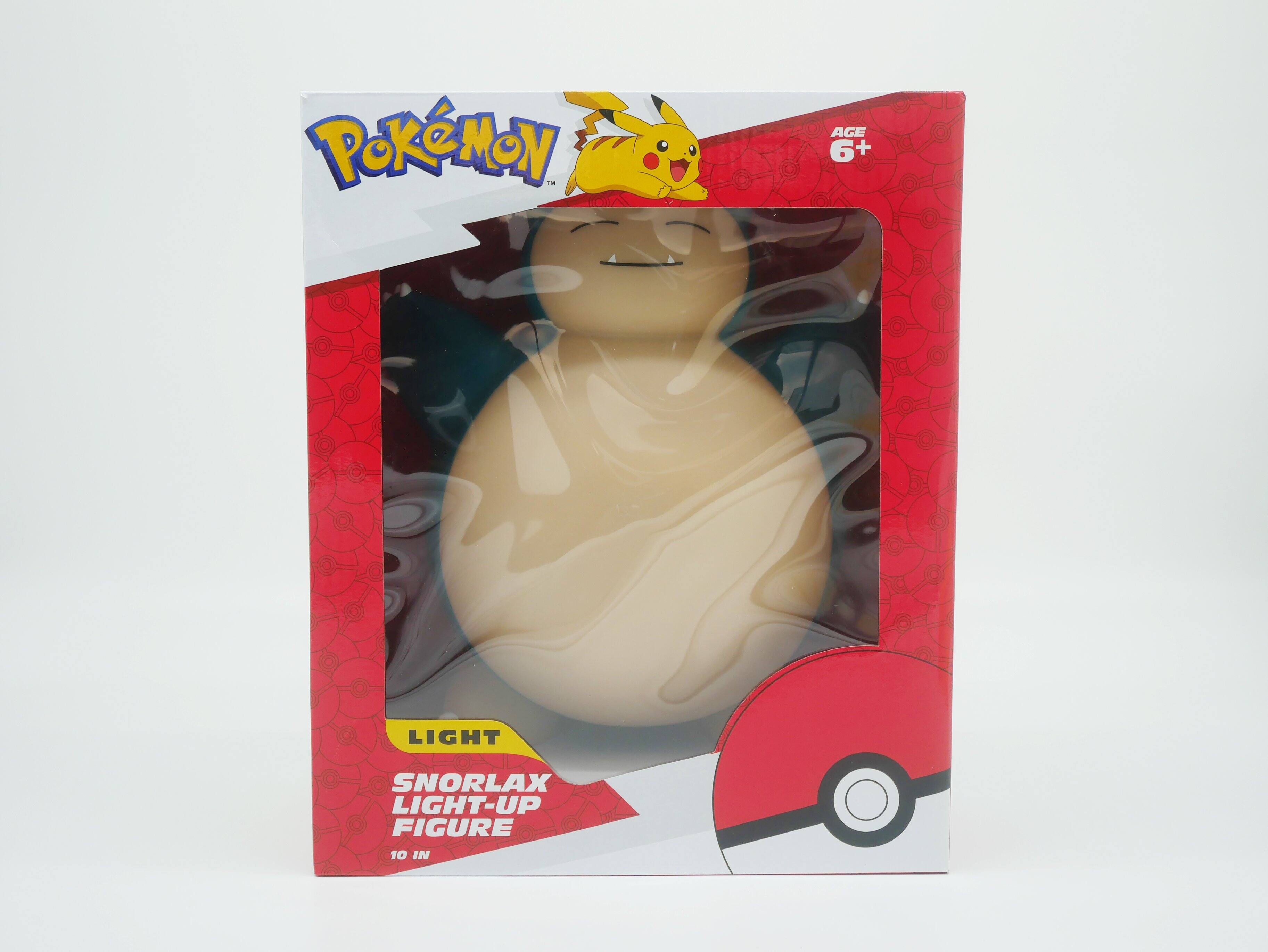 Pokémon: Age 6+  
Light Snorlax Light-Up Figure  
10 in