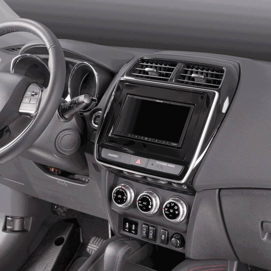 The text on the image reads "VLIZ -N A PASSENGER ARBAD 55 i I - AKC - 92 - $". This text is likely related to the car's features or pricing information. However, it is not possible to provide a more accurate interpretation without additional context or information about the car model and its specifications.