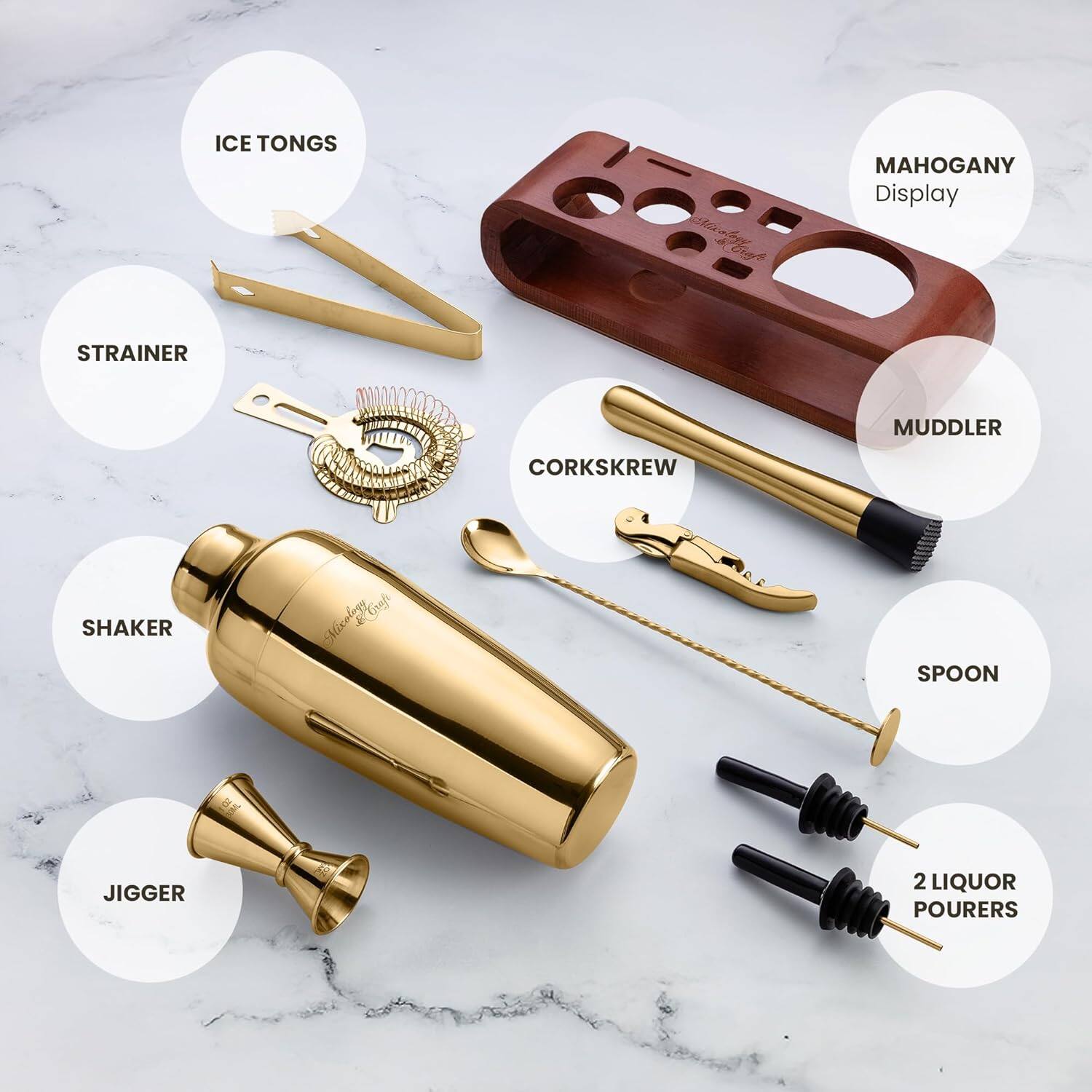 - ICE TONGS
- STRAINER
- CORKSREW
- MUDDLER
- SPOON
- JIGGER
- 2 LIQUOR POURERS
- MAHOGANY Display
- SHAKER
