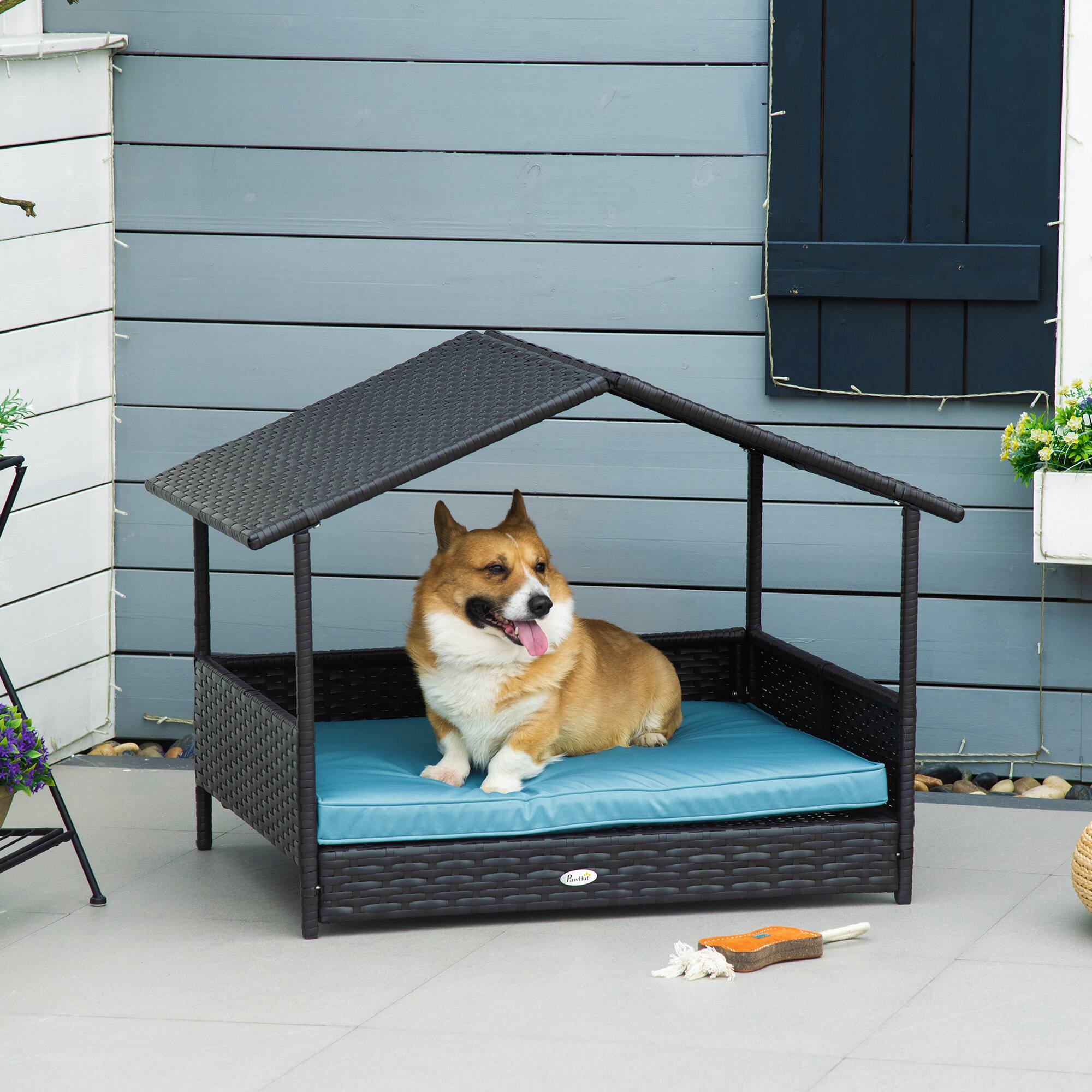 Angle. Pawhut - Wicker Dog House Outdoor, Canopy, Rattan Bed, Water-resistant Cushion, 66 lbs, 19.75", Brown Wicker, Blue Cushion - Blue.