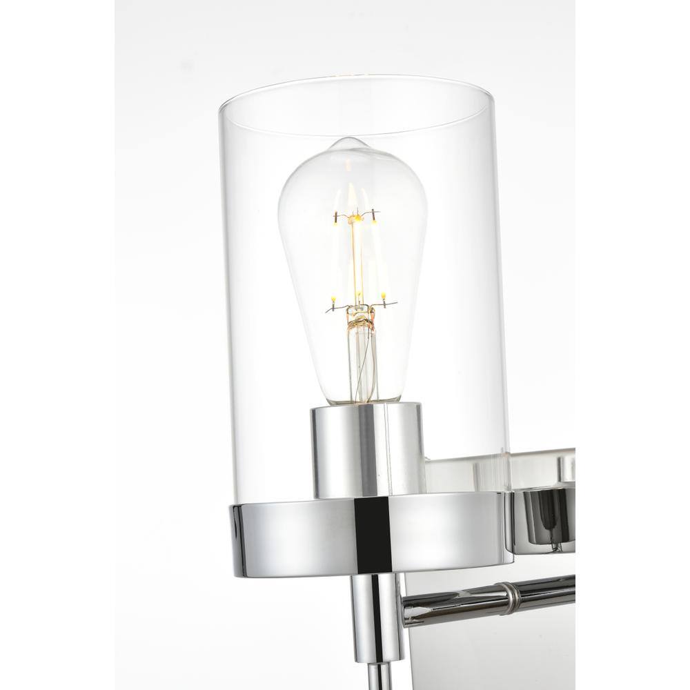 Left. Living District - Benny 1 light Chrome and Clear Bath Sconce - Chrome And Clear.