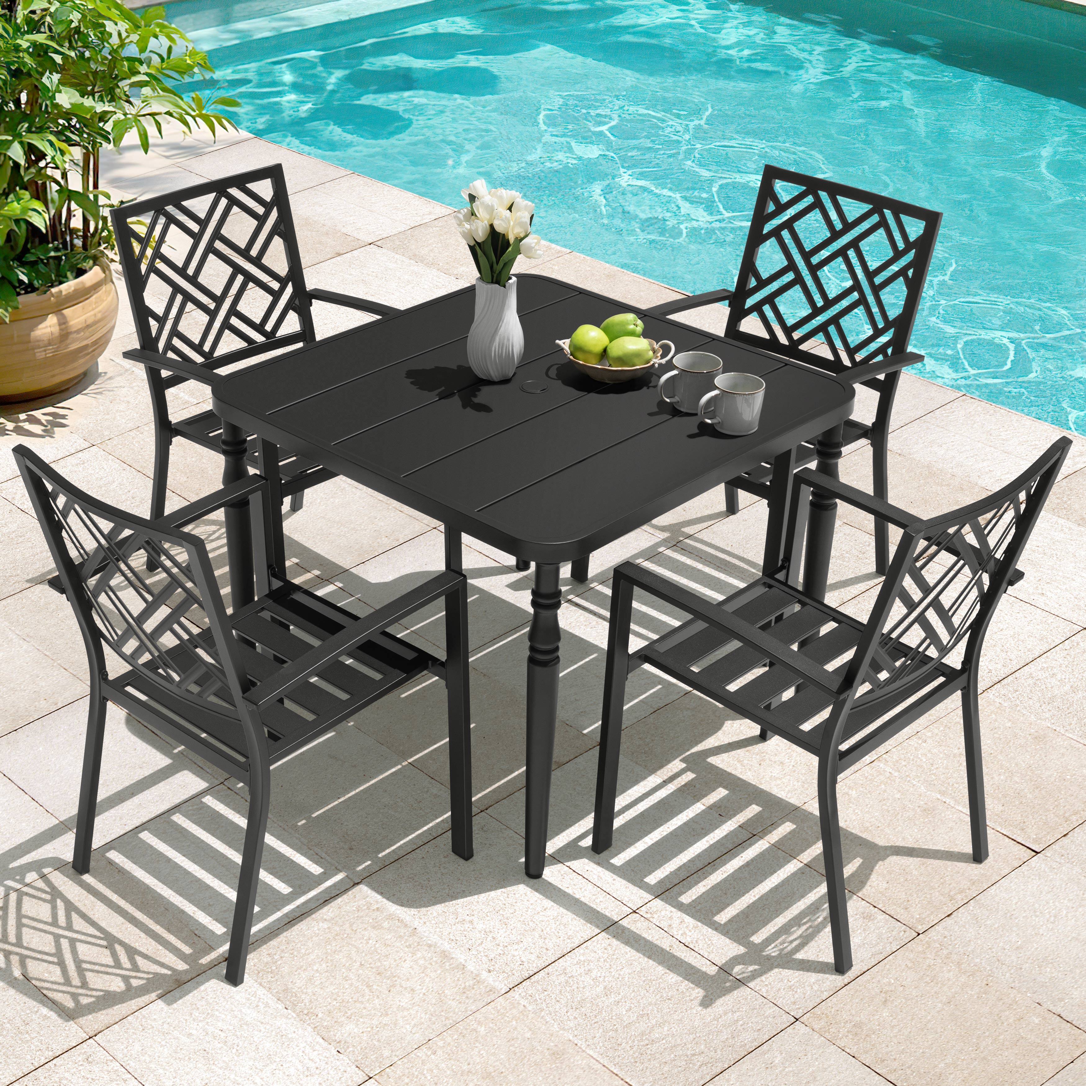 Left. Nuu Garden - 5-Piece Metal Patio Dining Set with Umbrella Hole and 4 Stackable Chairs - Black.