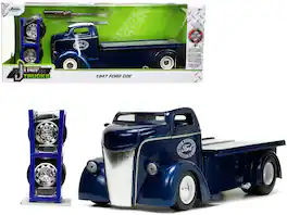1947 Ford COE Flatbed Truck Dark Blue Metallic with White Top "The Famous Motor Cars" w/Extra Wheels 1/24 Model by Jada - Multicolor