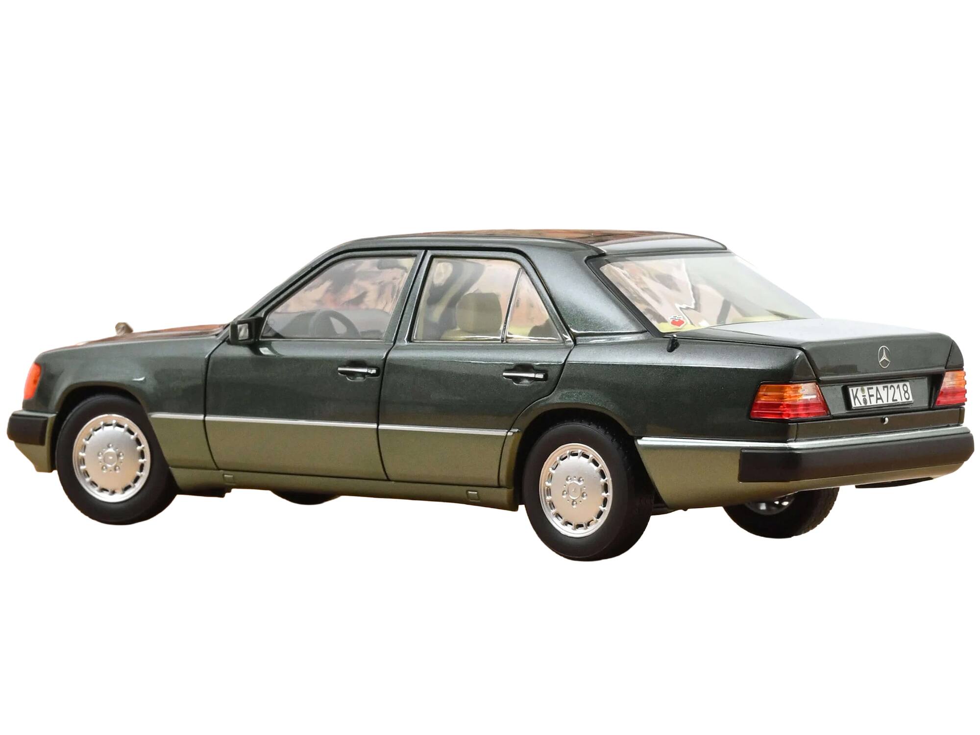 Alt View 5. Norev - 1990 Mercedes-Benz 230 E Night Green Metallic with Green Interior 1/18 Diecast Model by Norev.