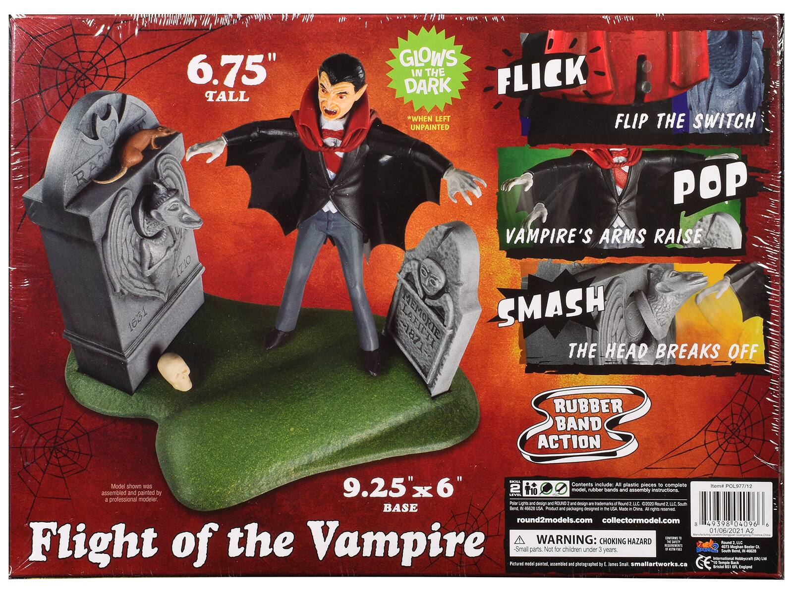 Sure, here is the corrected and grouped text from the image:

---

**Flight of the Vampire**

- **6.75" TALL**
- **9.25" x 6" BASE**

**Features:**
- **GLOWS IN THE DARK** *WHEN LEFT UNPAINTED*
- **FLICK** *FLIP THE SWITCH*
- **POP** *VAMPIRE'S ARMS RAISE*
- **SMASH** *THE HEAD BREAKS OFF*
- **RUBBER BAND ACTION**

**Model shown was assembled and painted by a professional modeler.**

**Contents include:**
- All plastic pieces to complete
- Rubber bands
- Assembly instructions

**Warning:**
- Small parts. Not for children under 3 years.
- CHOKING HAZARD

**Item # POL977/12**

**Round 2 Models**
- round2models.com
- collectormodel.com

**Pictured model painted, assembled and photographed by:**
- J. Small, smallartworks.ca

**Design and packaging signed by:**
- L. Lina

**Made in China**

**Barcode:**
- 4959810409