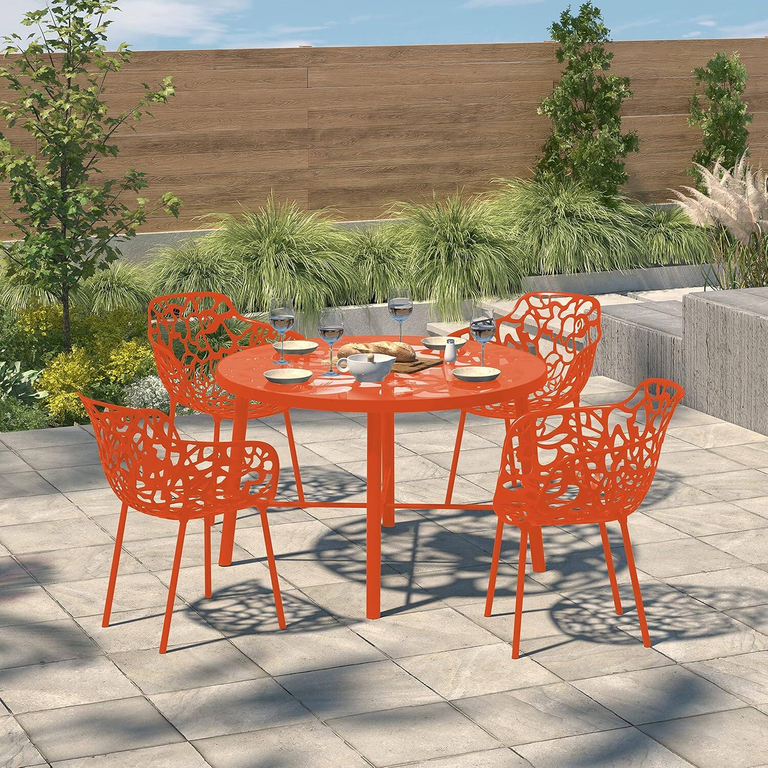 Angle. LeisureMod - Devon (Set of 4) Aluminum Outdoor Dining Chair - UV & Rust Resistant Stackable Floral Accent Chair - Orange.