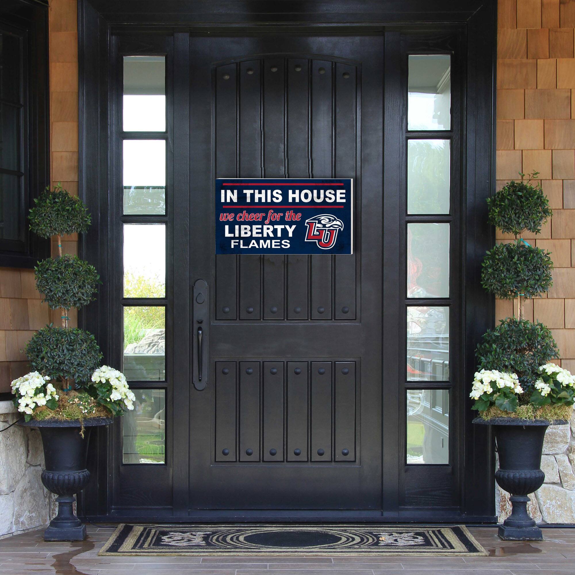 IN THIS HOUSE  
we cheer for the  
LIBERTY FLAMES