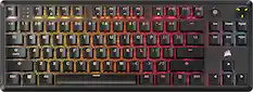 The image shows a close-up of a colorful keyboard with a rainbow theme. The keys are arranged in rows, and the text on the image is grouped as follows:
1. Esc
2. T
3. F1
4. F2
5. F3
6. F4
7. F5
8. F6
9. H
10. N
11. F7
12. F8
13. F9
14. F10
15. F11
16. F12
17. 1
18. 2
19. 3
20. 4
21. $
22. 5%
23. 6
24. A
25. 7
26. 8
27. 9
28. (
29. )
30. -
31. +
32. Ins
33. Home
34. PgUp
35. Q
36. W
37. E
38. R
39. T
40. Y
41. U
42. I
43. O
44. P
45. [{
46. \
47. Del
48. End
49. PgDn
50. CAPS
51. A
52. S
53. D
54. F
55. G
56. H
57. J
58. K
59. L
60. ;
61. Z
62. X
63. V
64. N
65. M
66. <
67. >
68. ?
69. K7
70. Ctrl
71. Alt
72. Fn